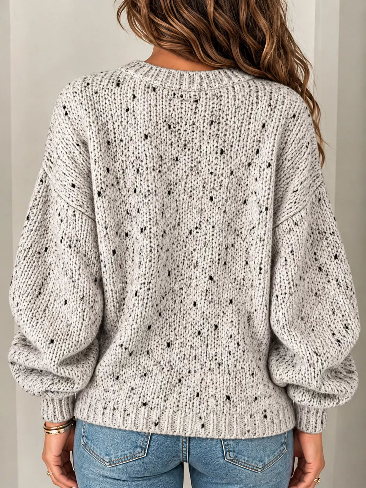 Beige chunky knit round neck sweater, back view
