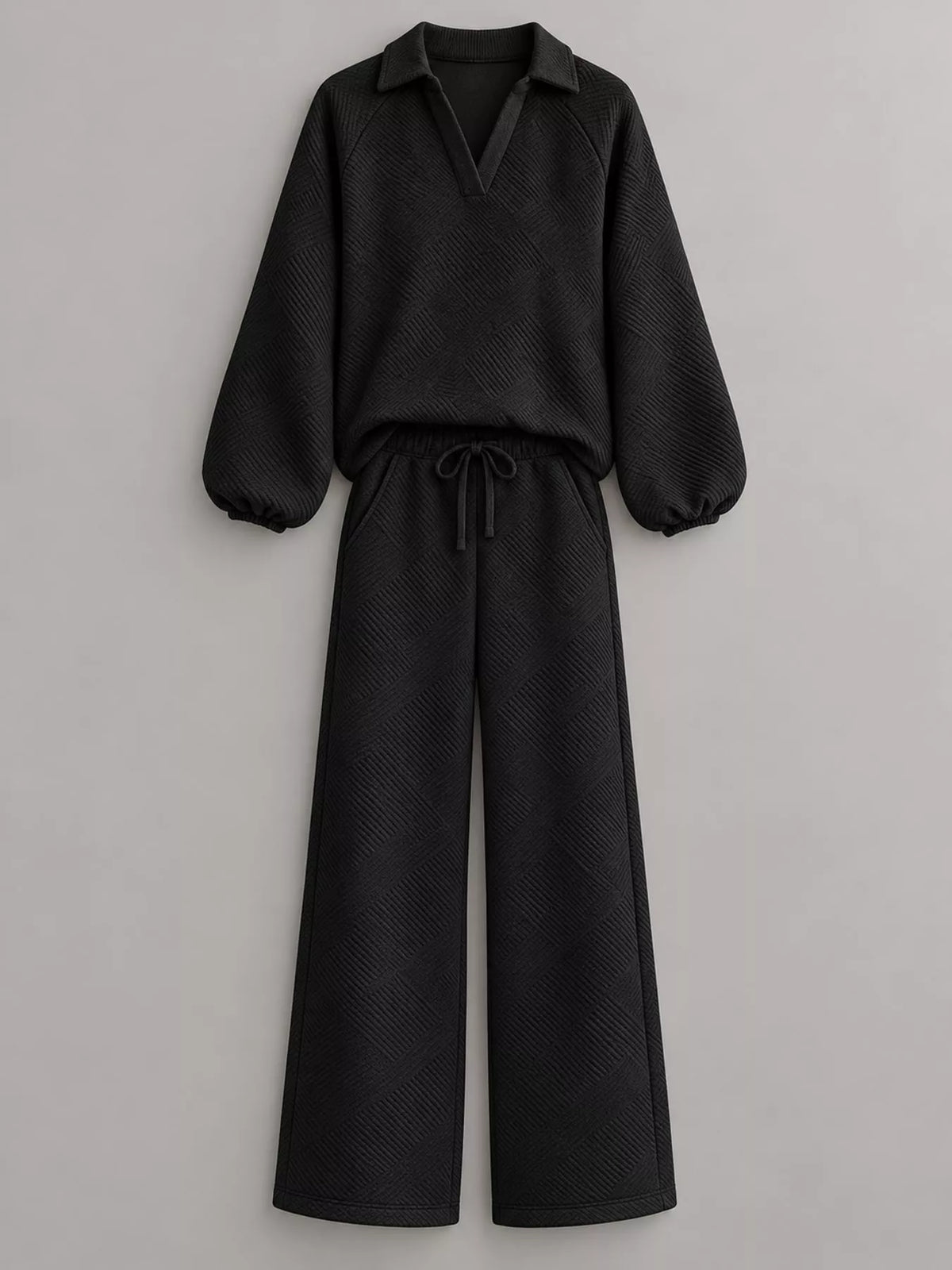 Black textured polo collar top and wide-leg pants set — front view
