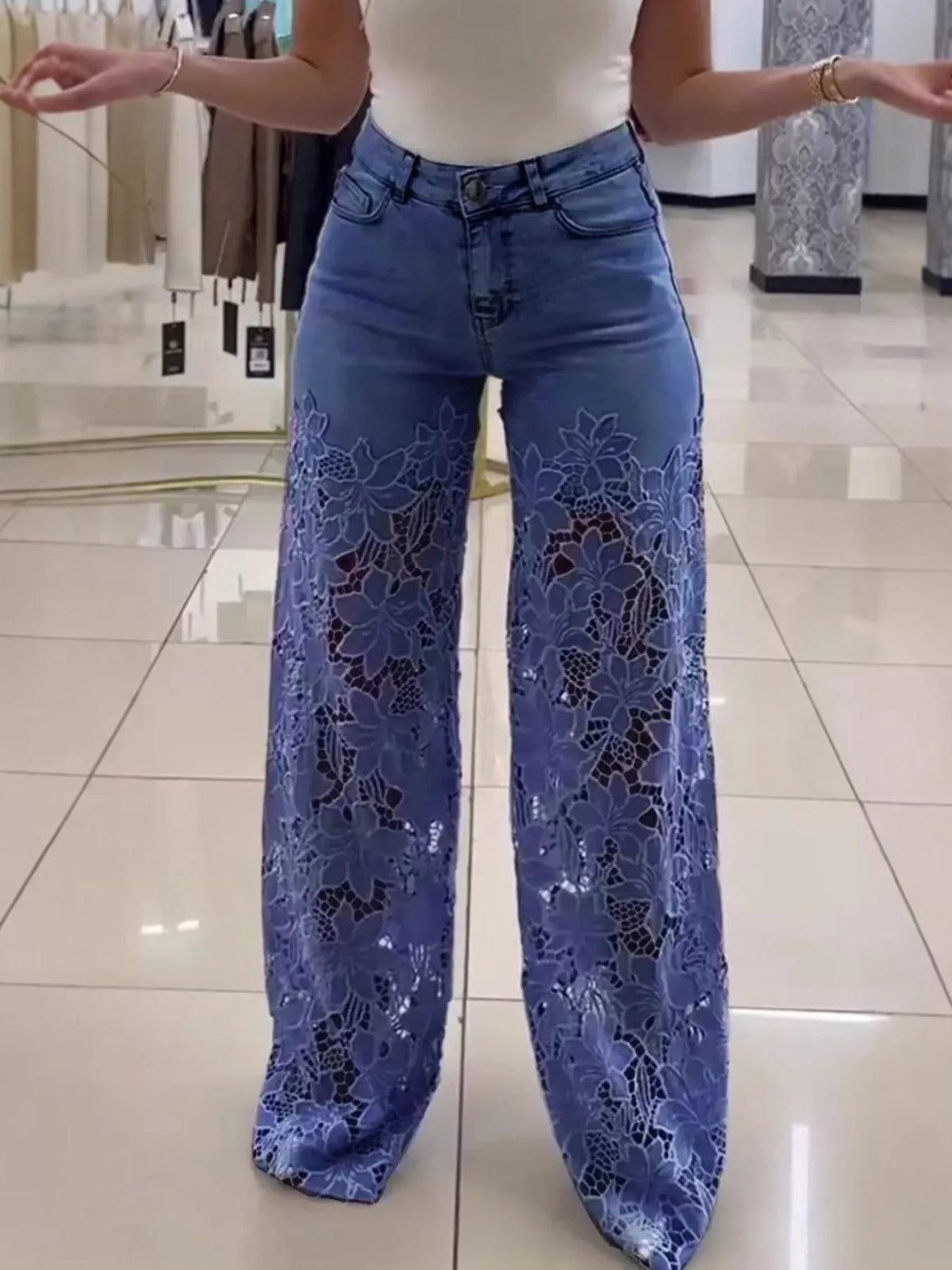 Blue lace cutout wide-leg jeans — front view