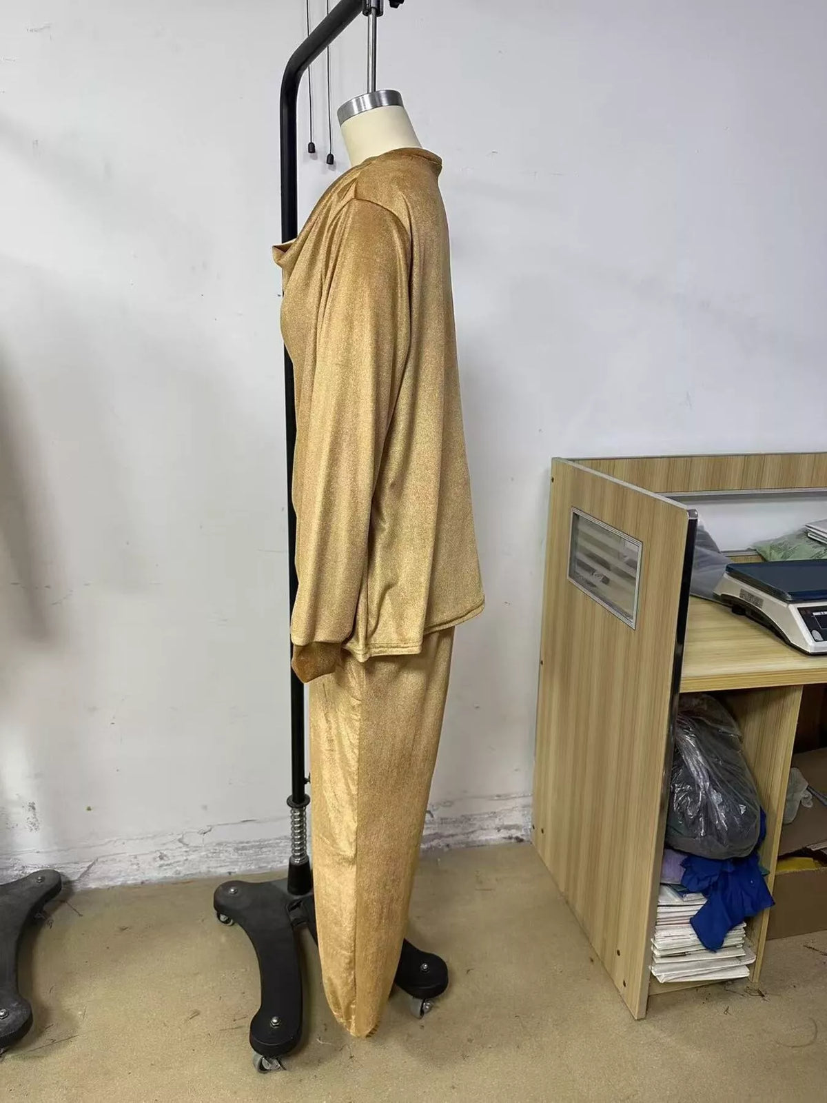 Gold velvet cowl neck top and pants set, side on mannequin