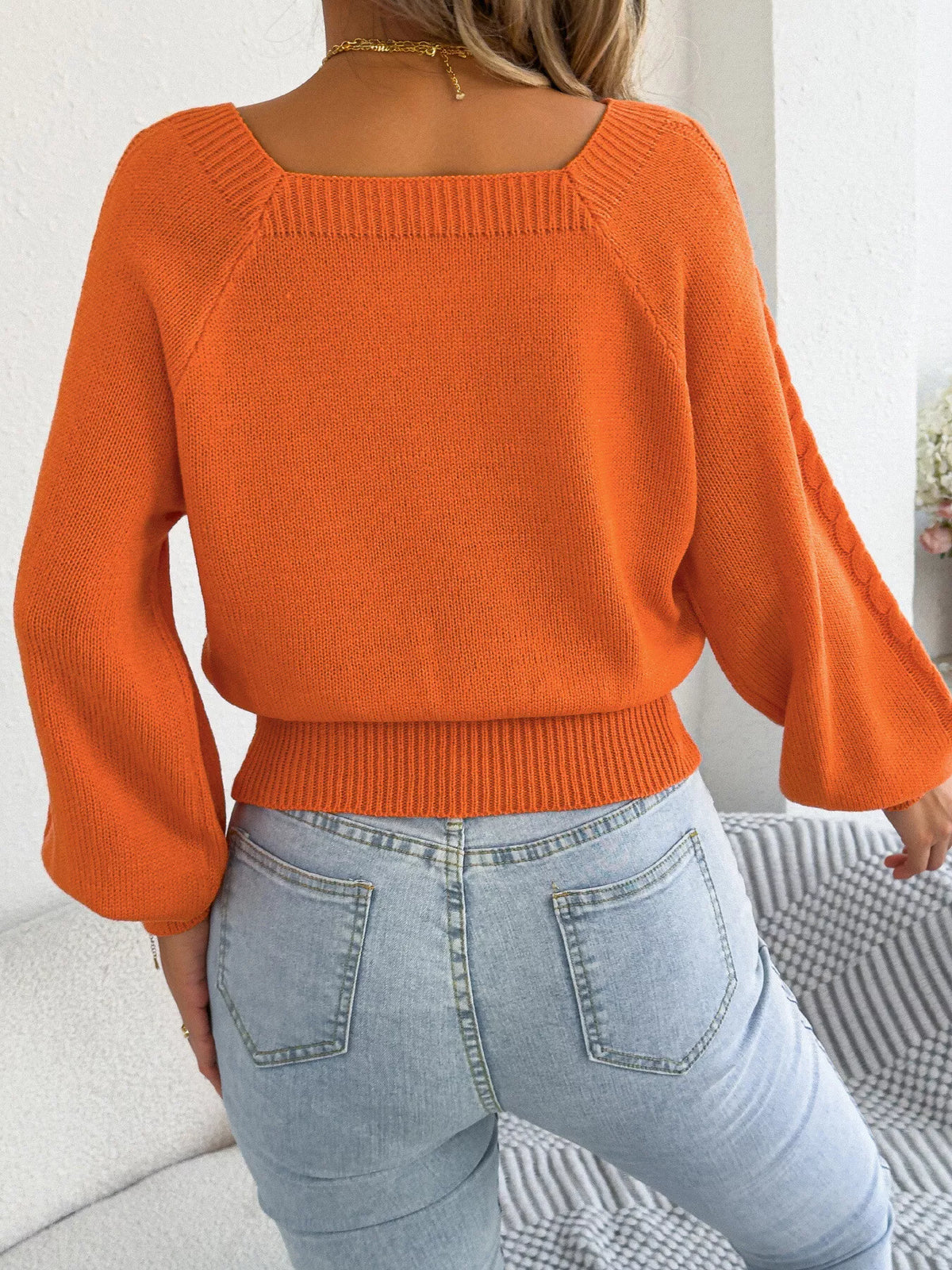 Square neck cable knit sweater, back view
