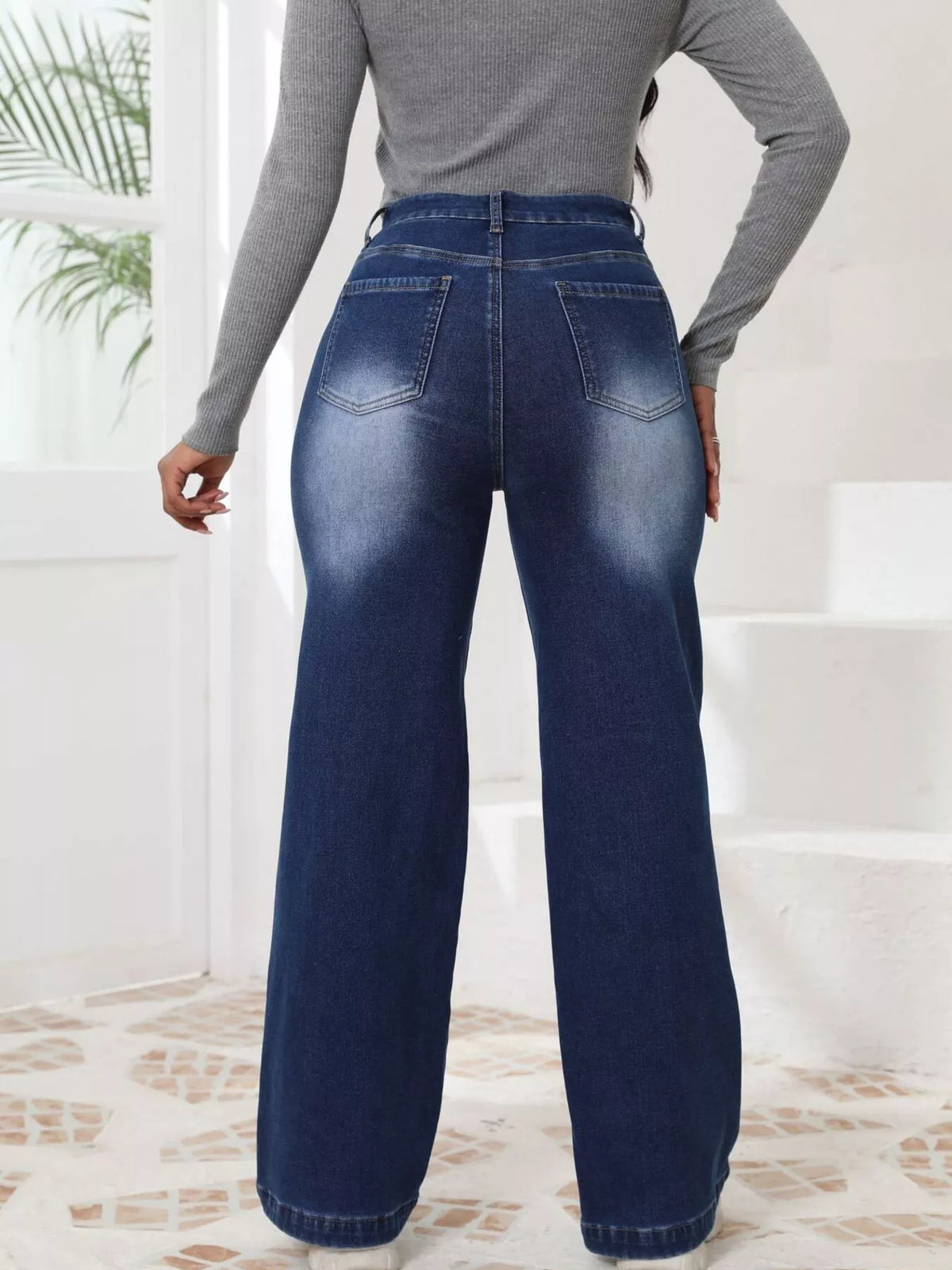 High-waisted washed wide-leg jeans