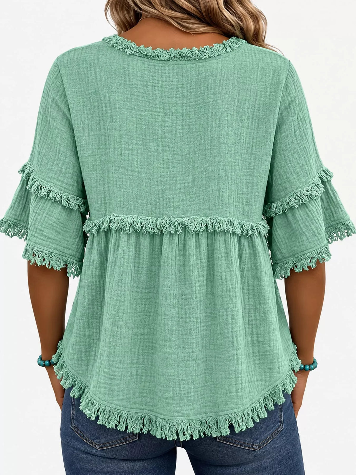 Green frayed edge textured blouse, back view