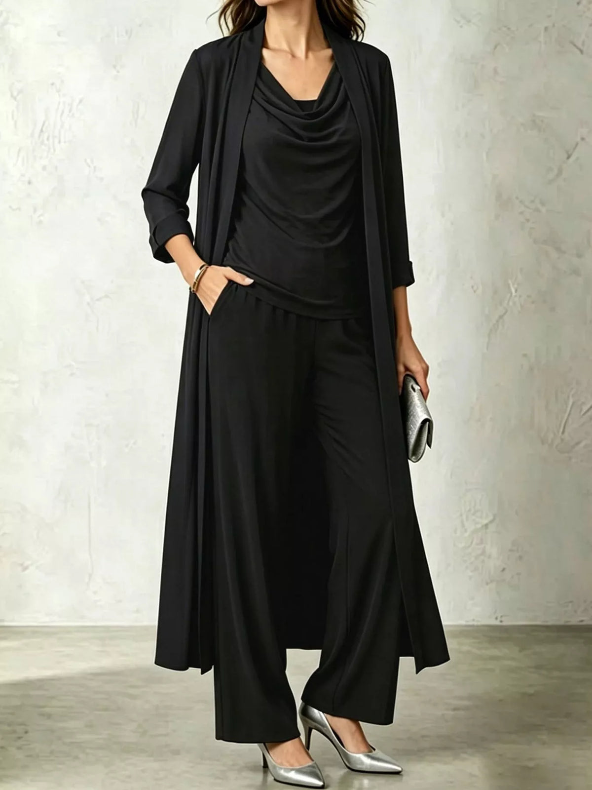 Black cowl neck top, cardigan and pants set, front view
