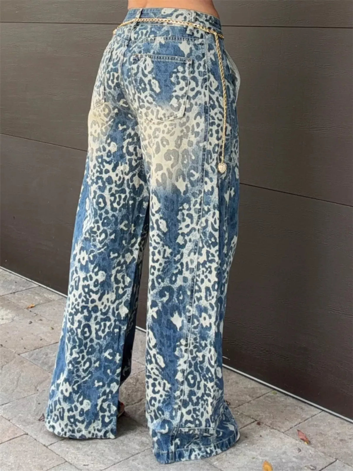 Blue high waisted leopard wide leg jeans, back view