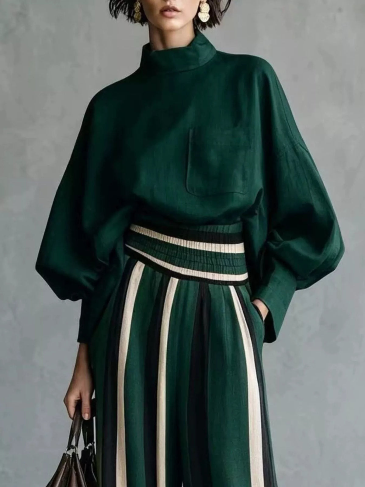 Green mock-neck blouse and striped wide-leg trouser set — design and construction details