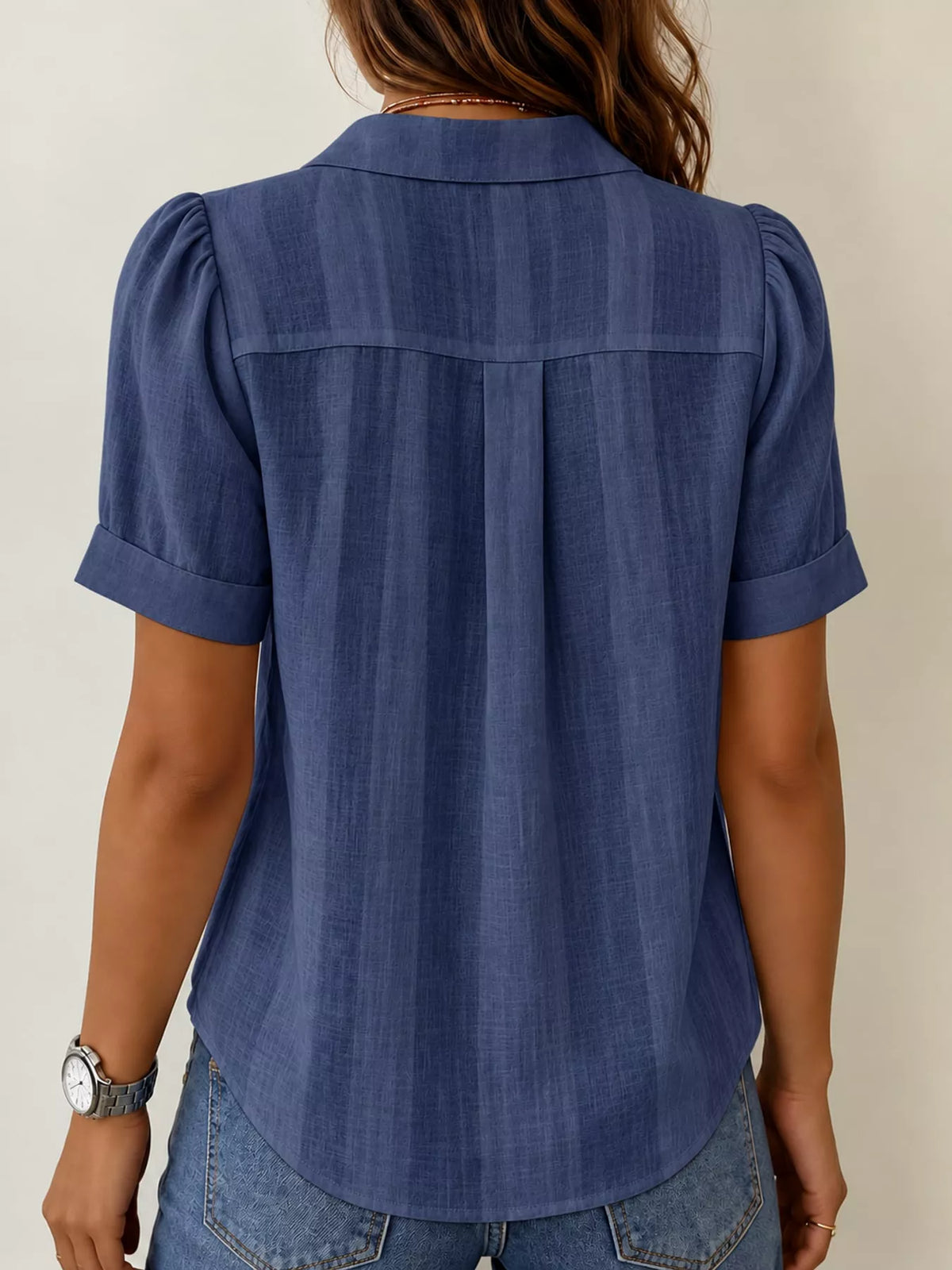Navy button up short sleeve shirt, back view