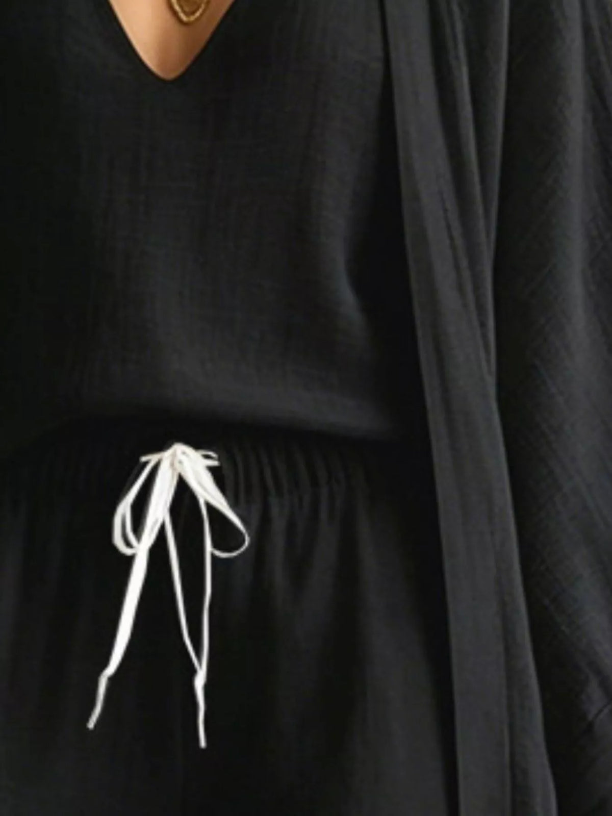 V-Neck Top, Cardigan and Pants Three-Piece Set in black, construction detail
