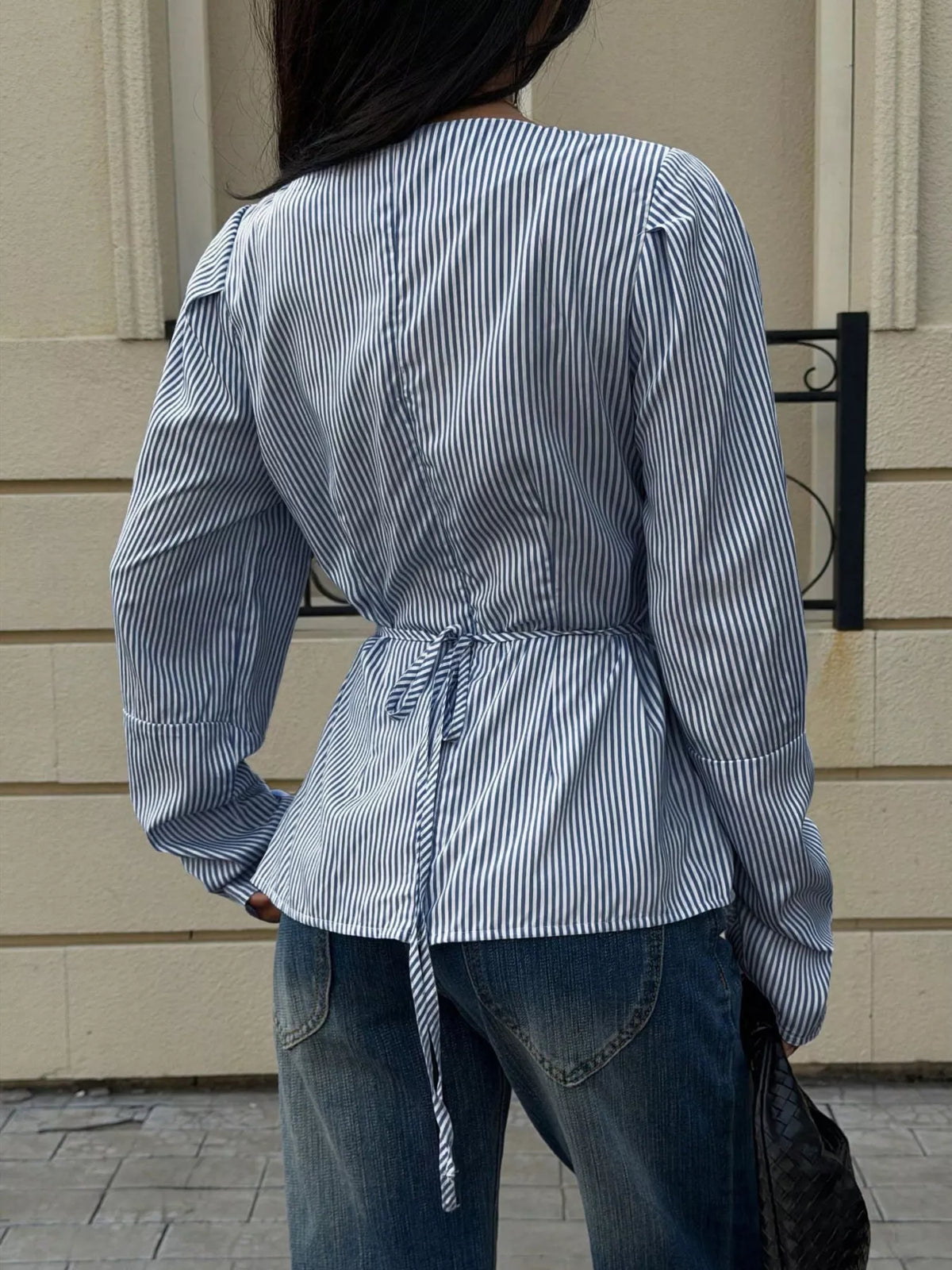 V-neck long sleeve blouse, back view