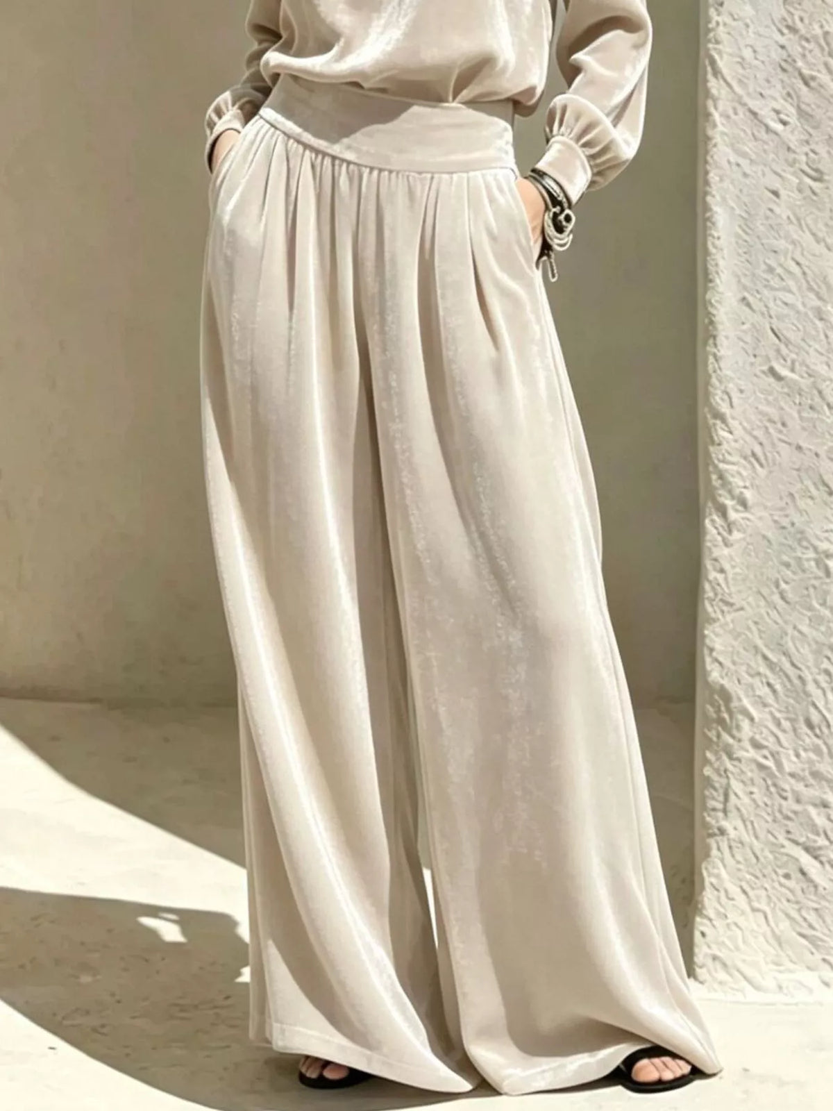 Cream velvet mock-neck top and pants set, pants detail