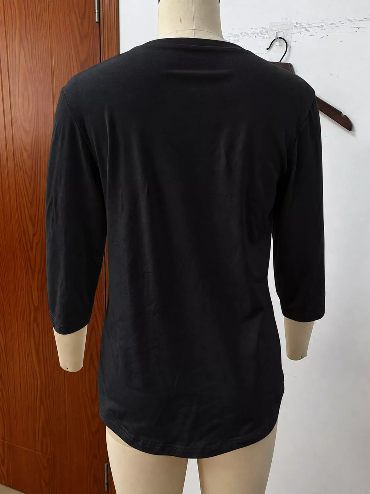 Black v-neck half sleeve t-shirt, back view