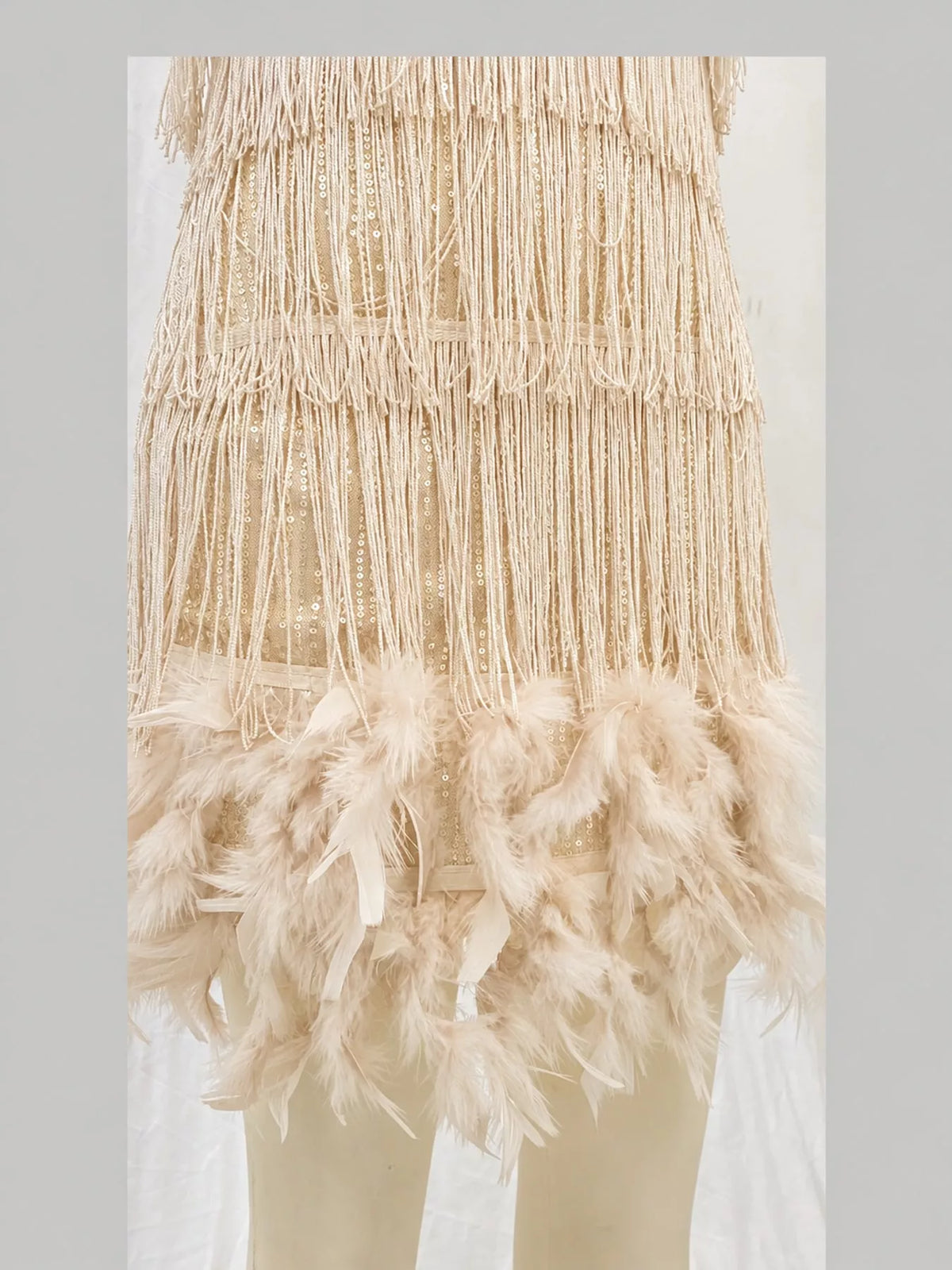 Cream feather fringe sequin mini dress, detail view