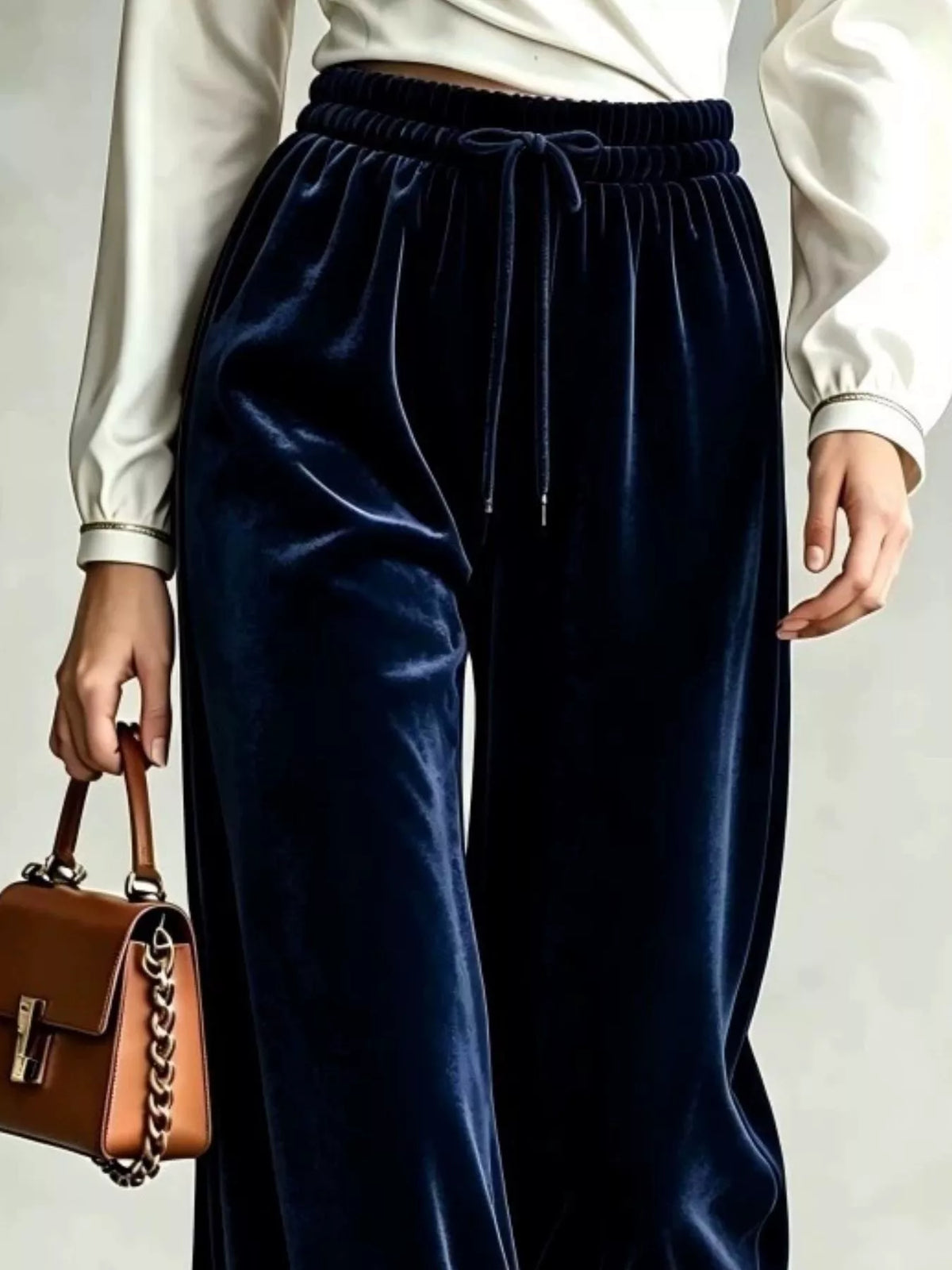 Navy wide-leg drawstring velvet pants, waistband detail
