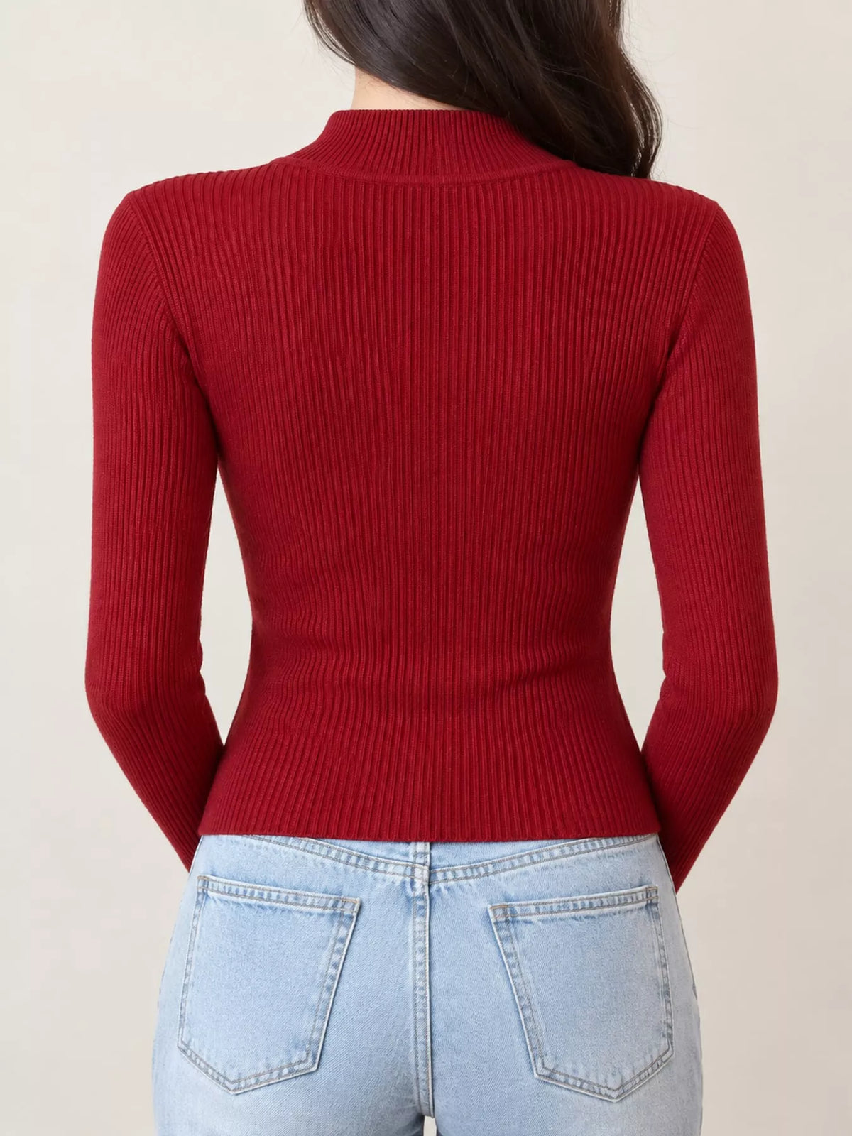 Dark red ribbed mock neck long sleeve knit top, back view