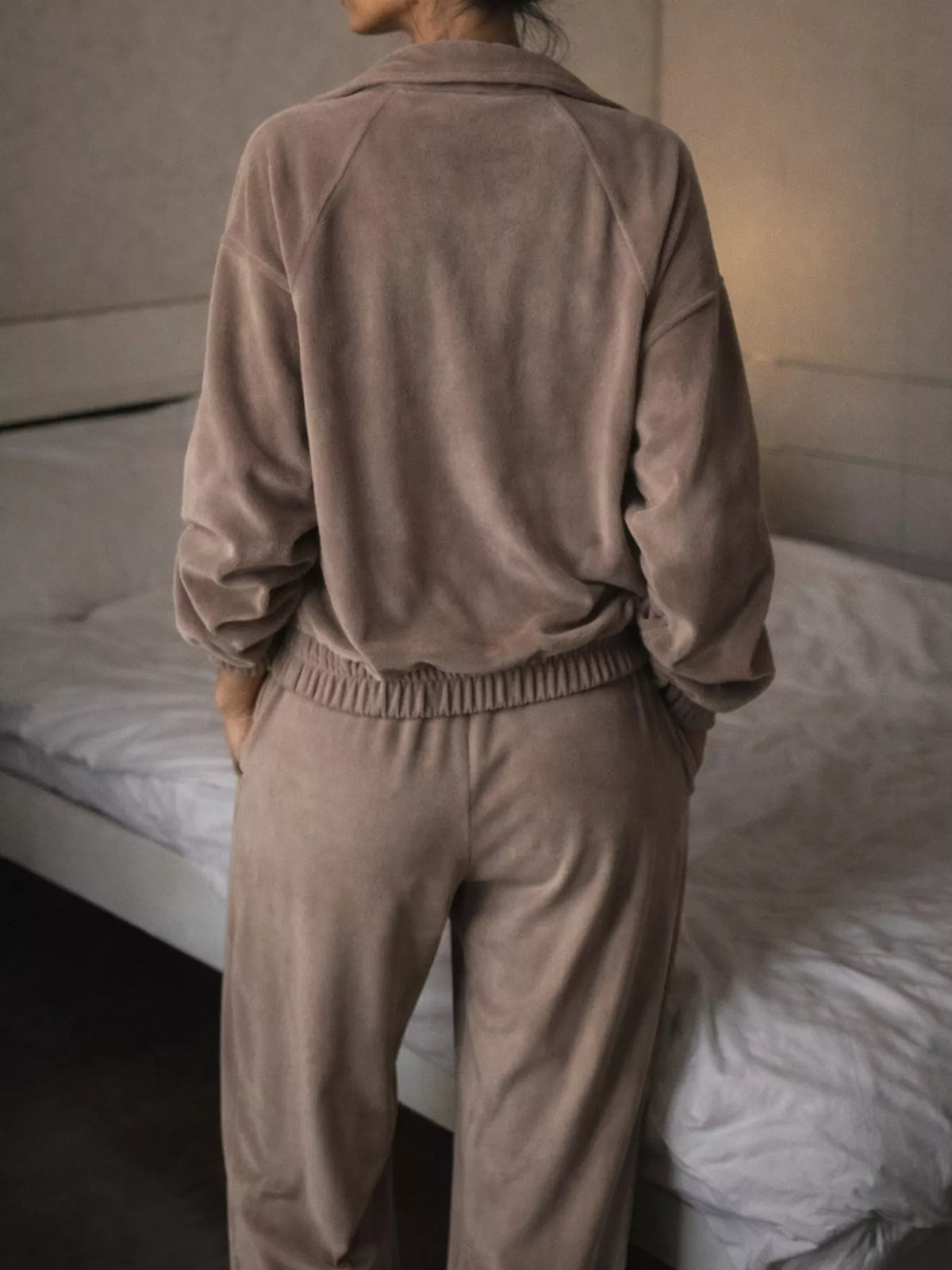 Brown zip-up outerwear and pants set — back view