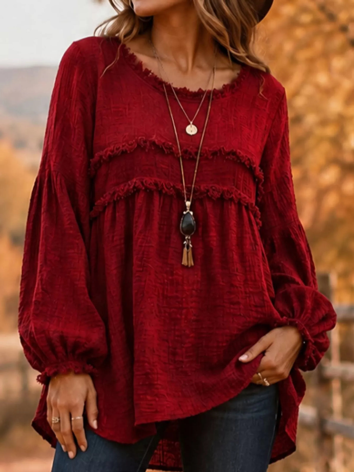 Red textured frayed-trim peplum blouse