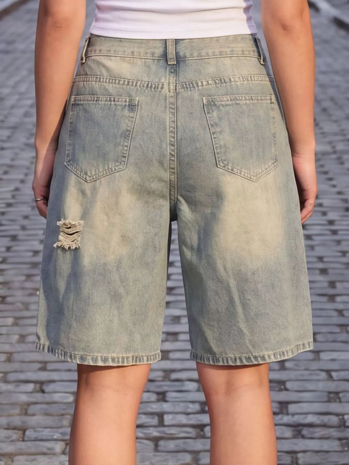 Distressed Loose Fit Denim Shorts, back view in vintage blue