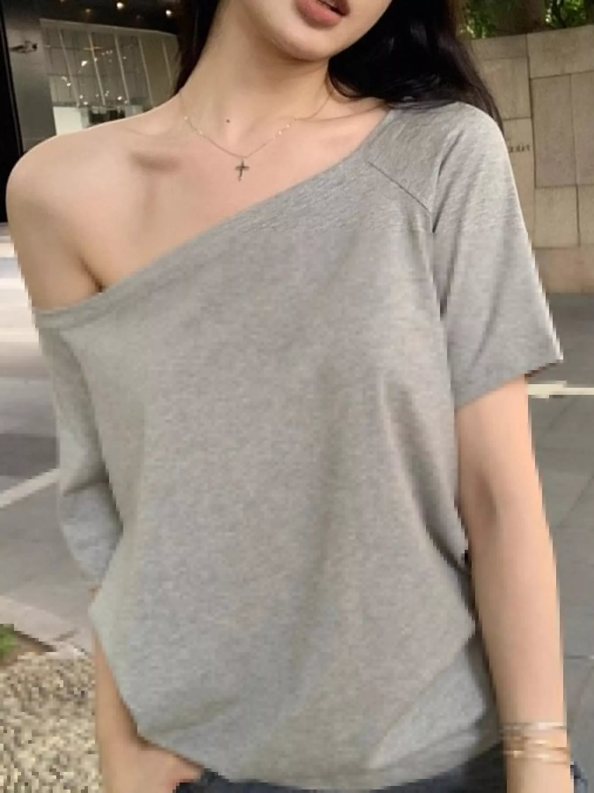 Gray asymmetric-neck T-shirt, front view