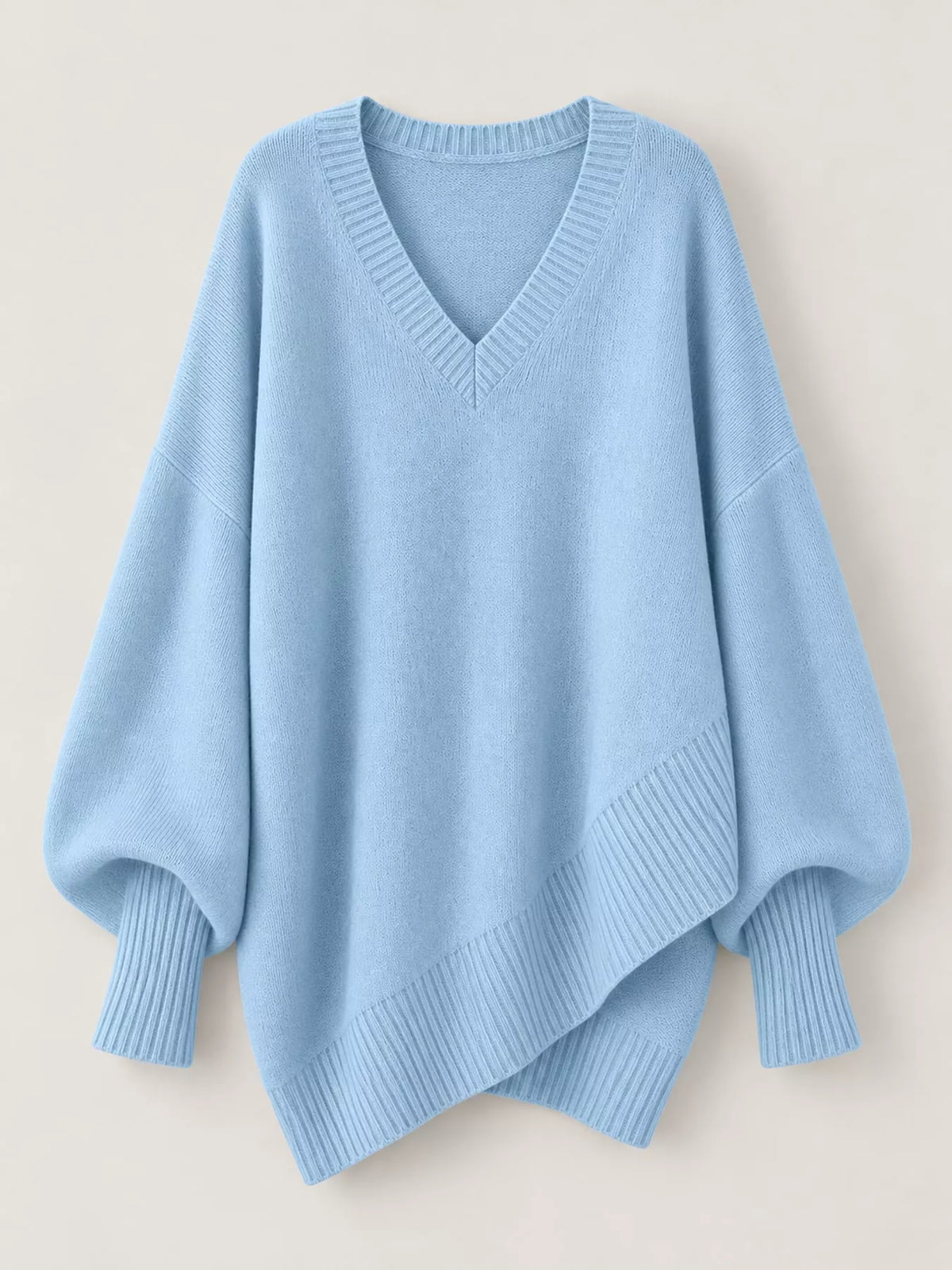 Batwing sweater, light blue flat lay