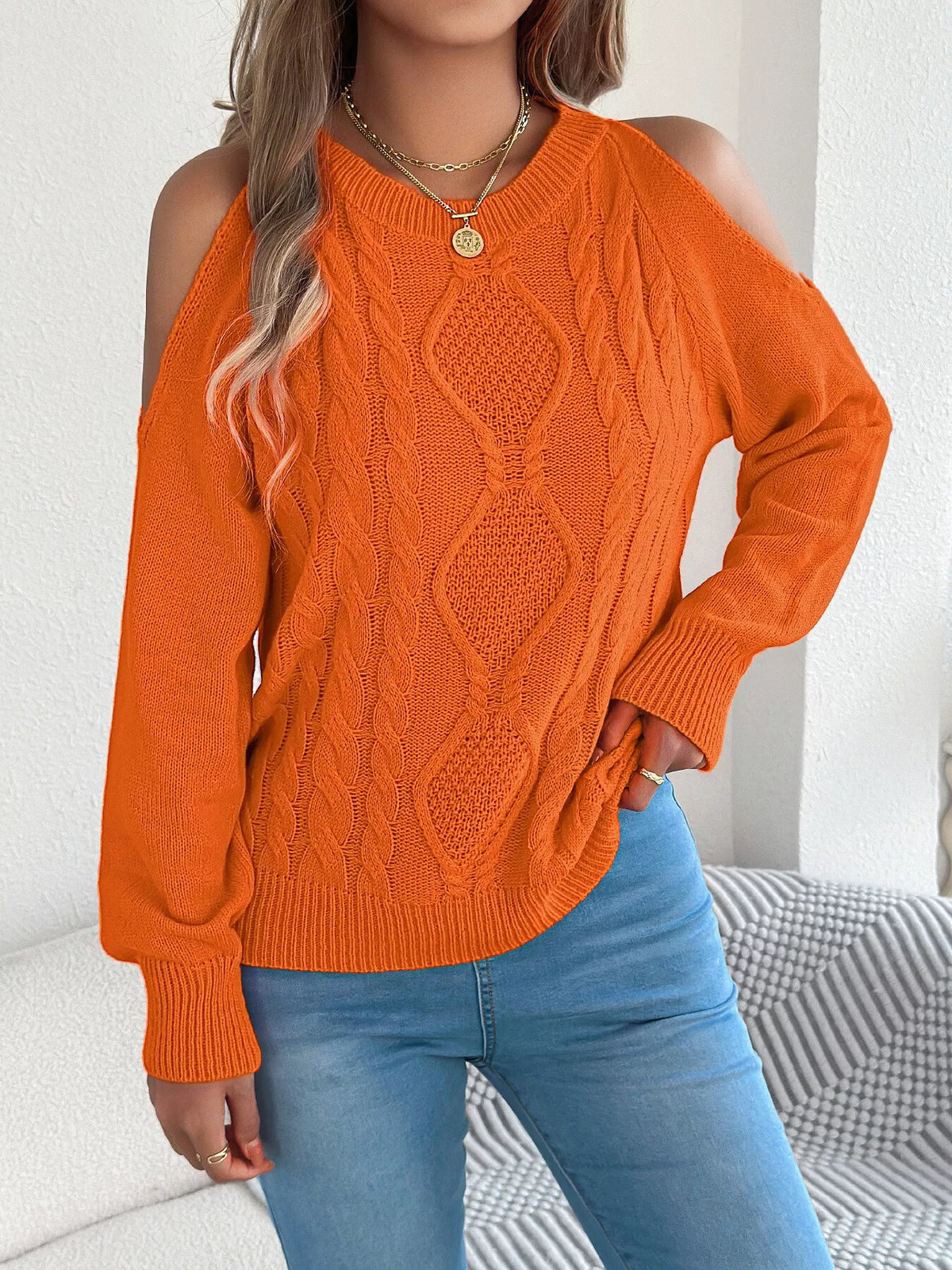 Orange cold shoulder cable knit sweater