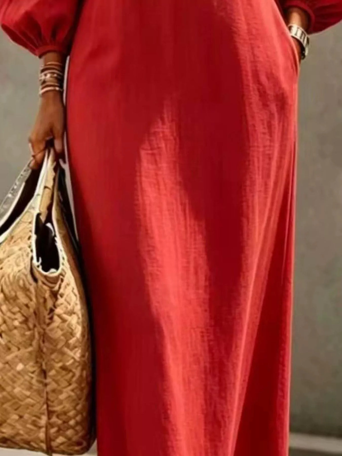 Red balloon-sleeve maxi dress, skirt detail