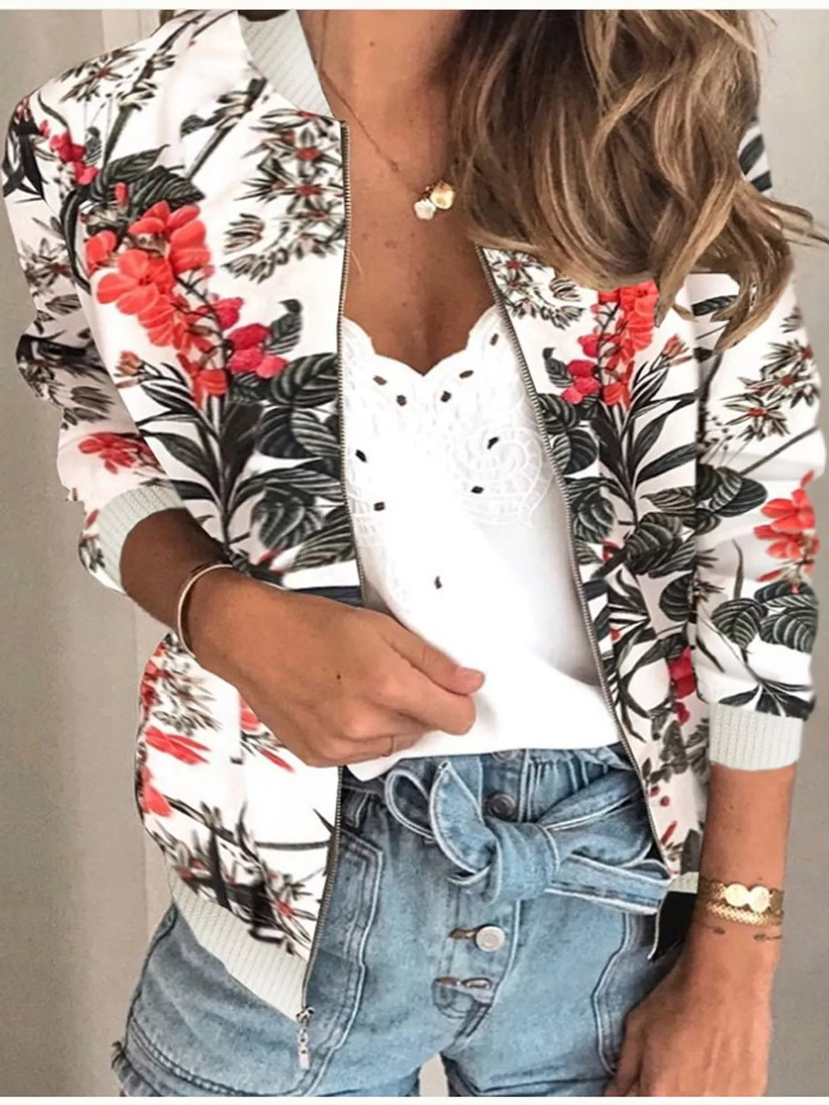 White and red floral printed zip-up bomber jacket — front view