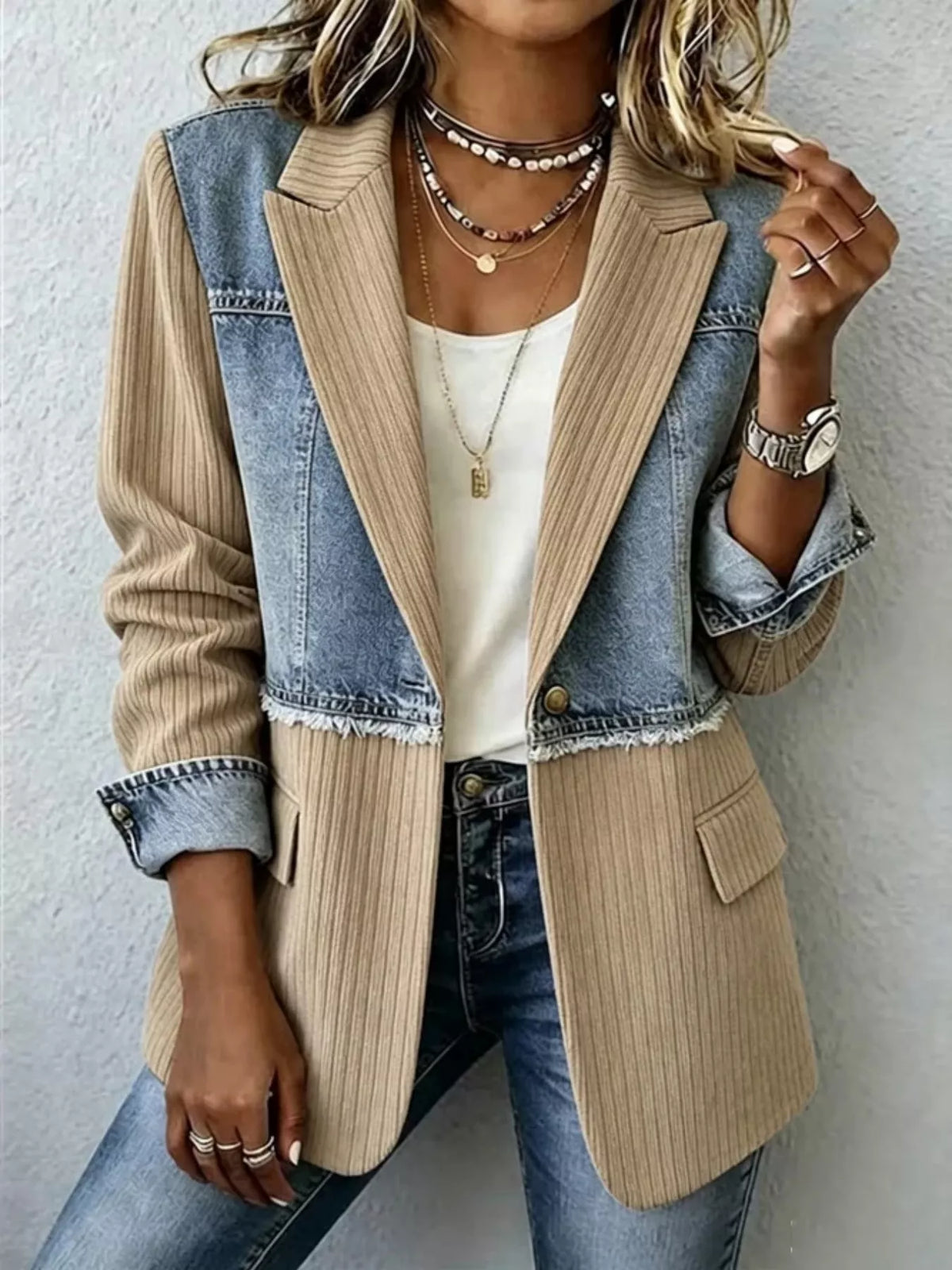 Beige and blue ribbed blazer with contrasting panels, front view