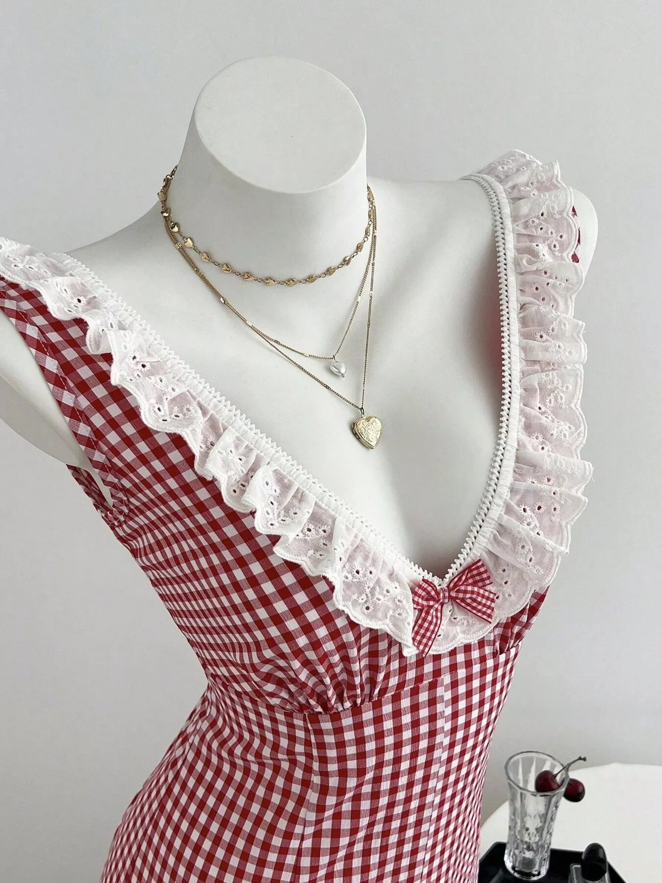 Trendsi Gingham Lace-Trimmed Romper with Bow Detail -