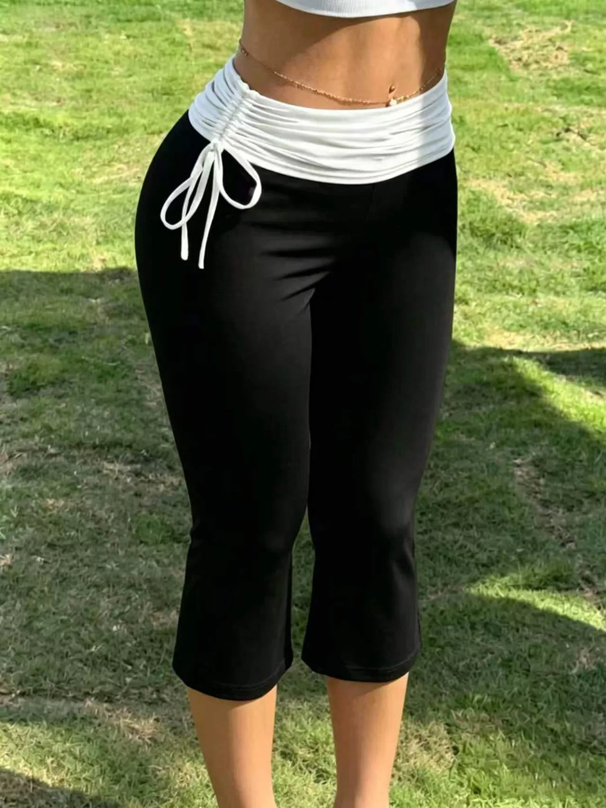 High-Waisted Ruched Drawstring Capri Pants in black and white, front view
