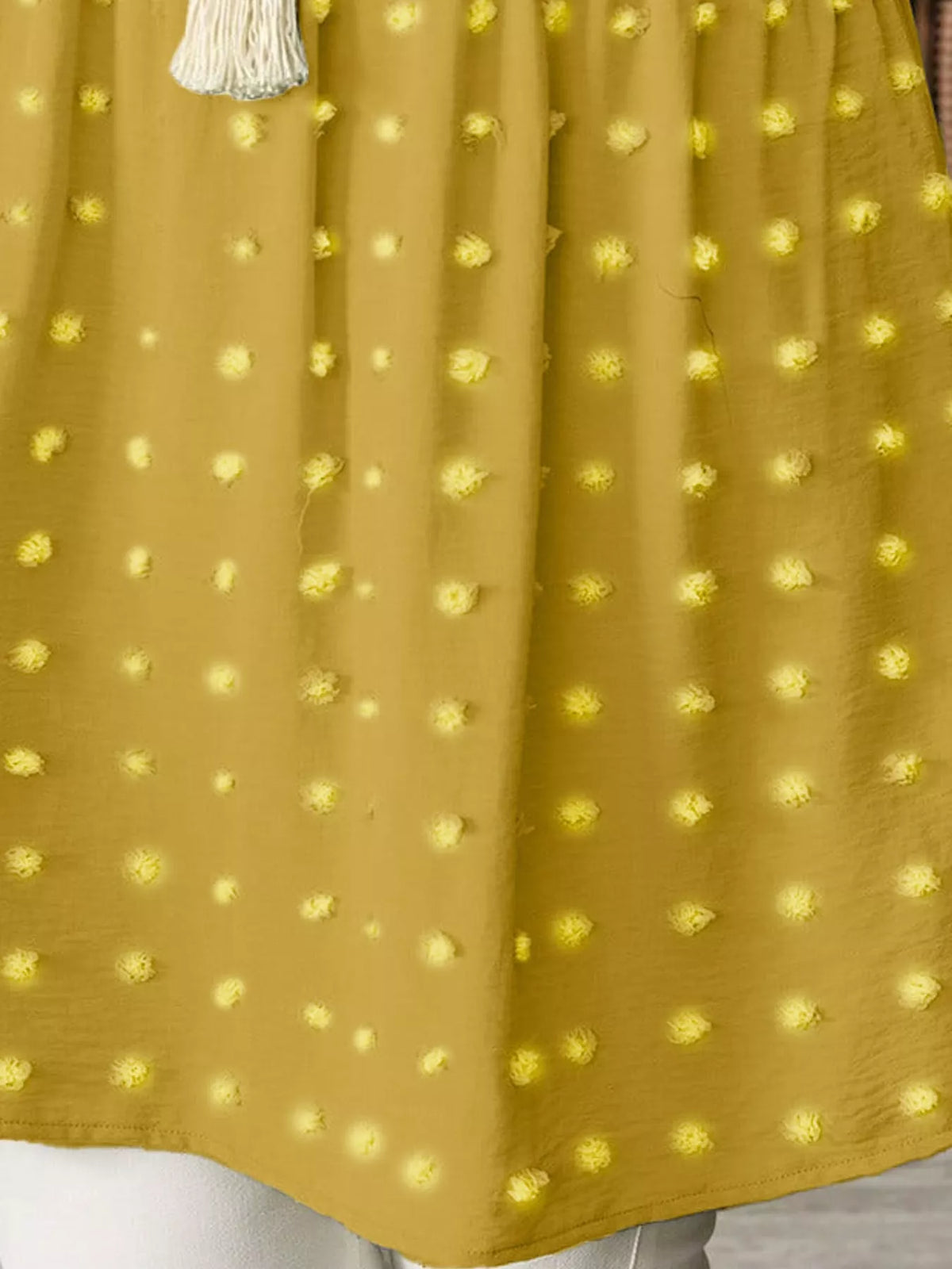 Swiss-dot blouse, yellow dot detail