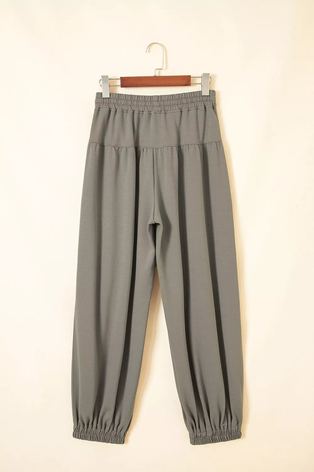 Drawstring Patch Pocket Jogger Pants in gray green, hanger back view