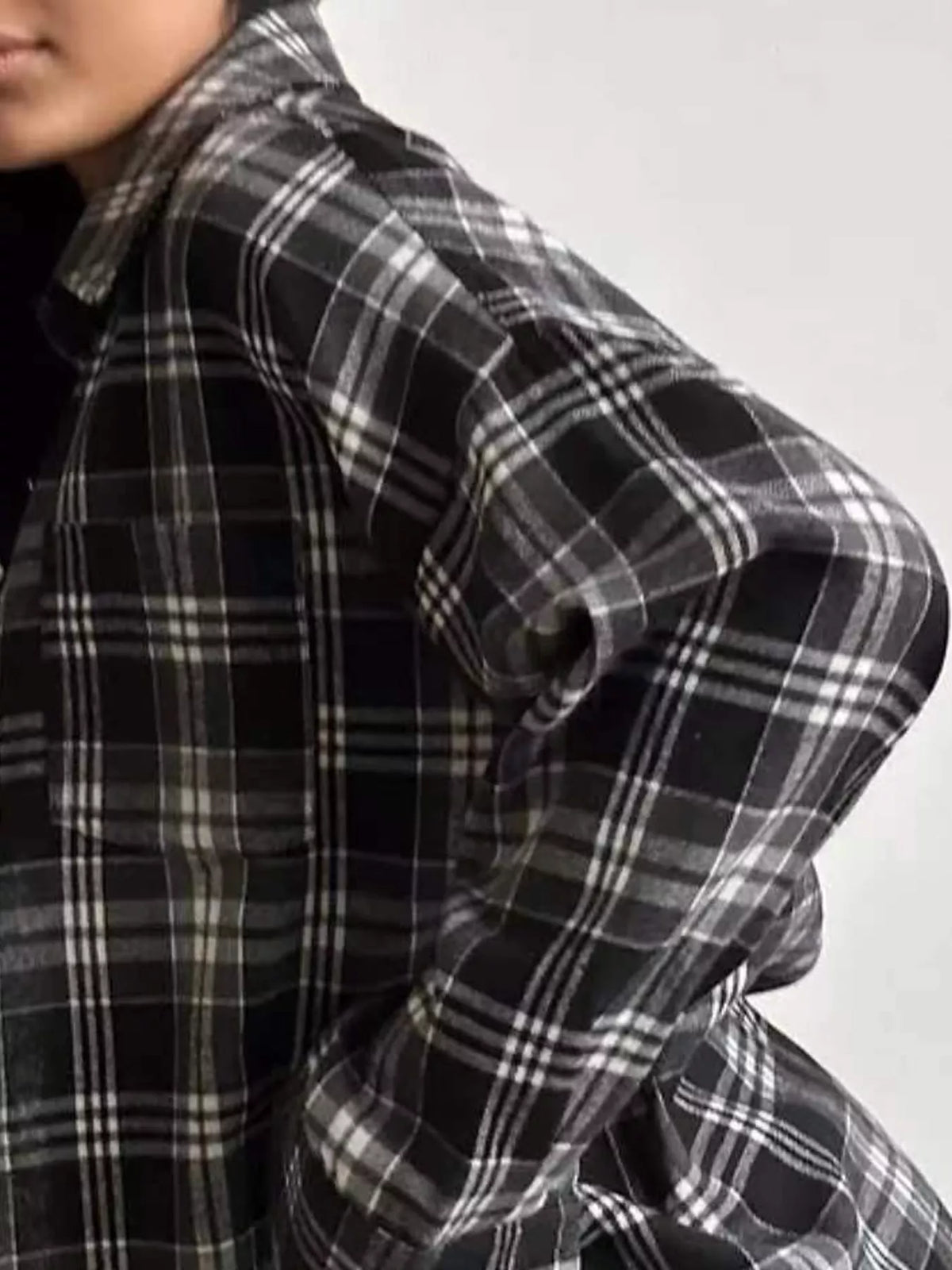 Black plaid button up shirt, detail view