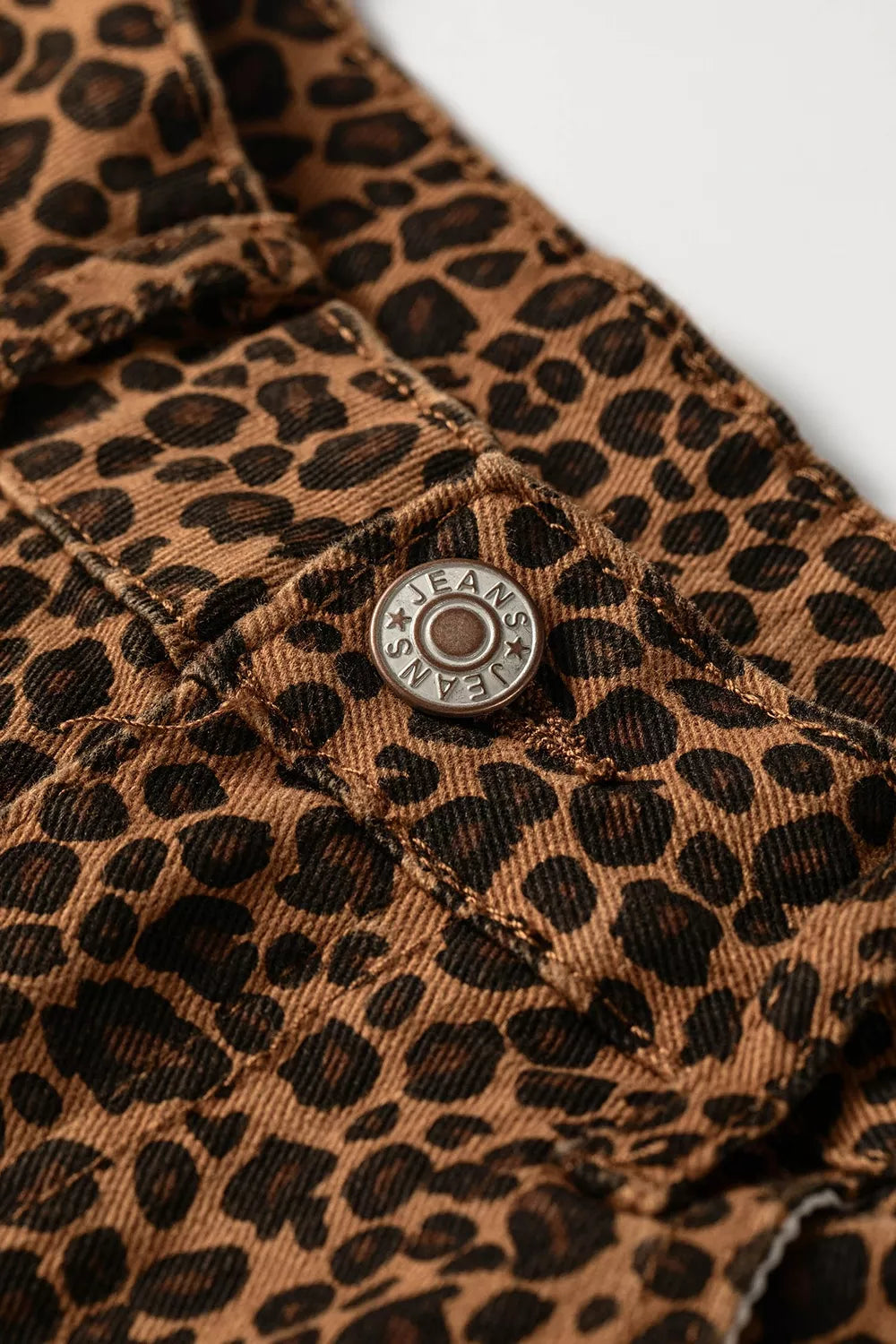 Leopard-print ruffle-hem jeans
