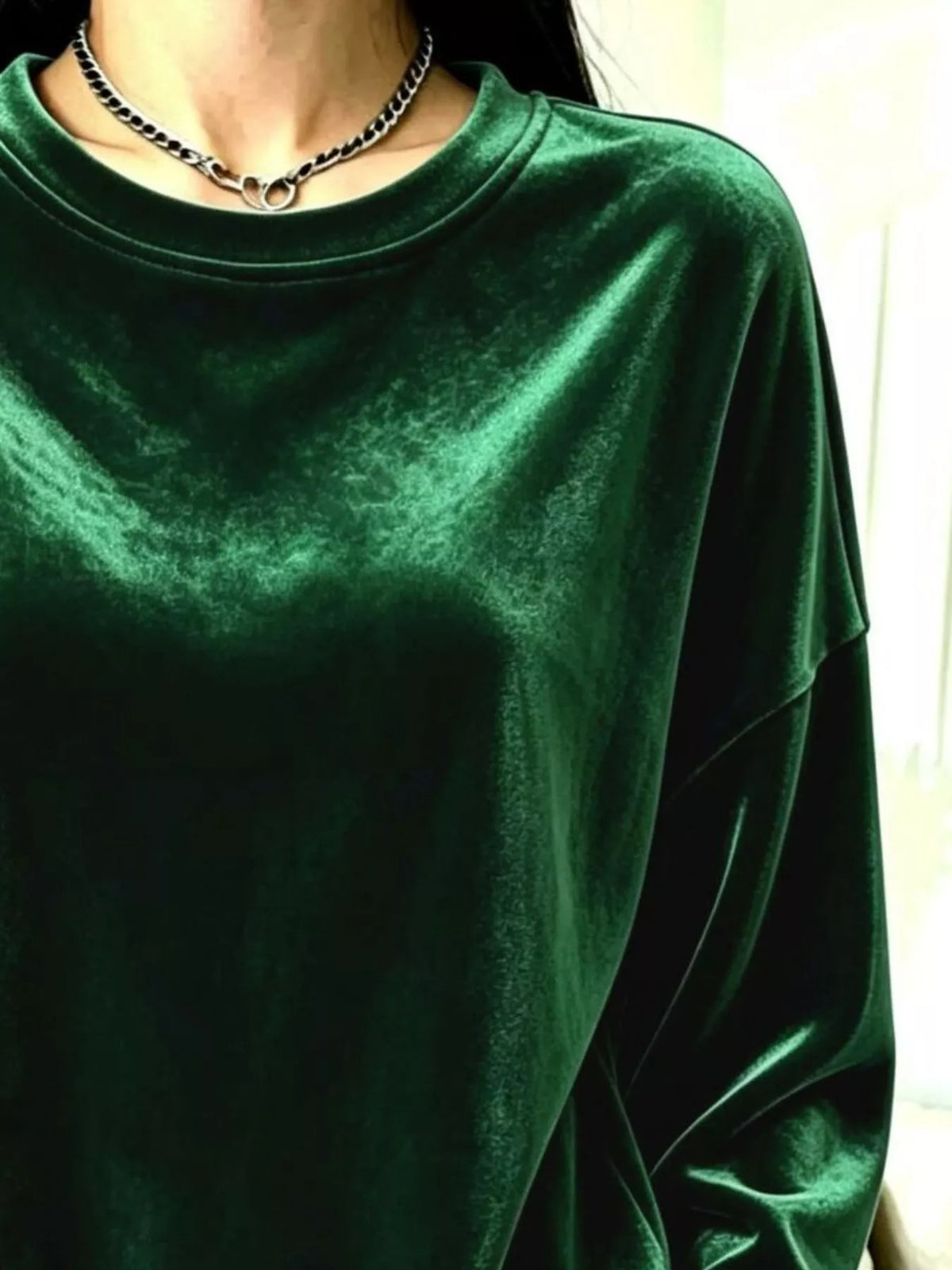 Women's Velvet Dropped Shoulder Sweatshirt in green — neckline detail view