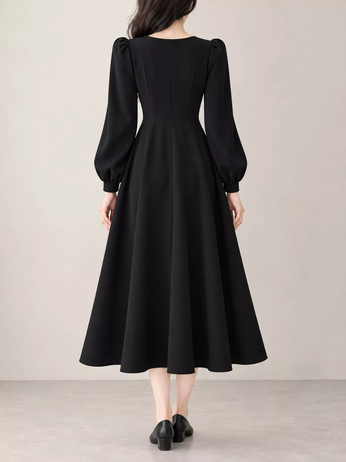 Black long sleeve a line midi dress, back view