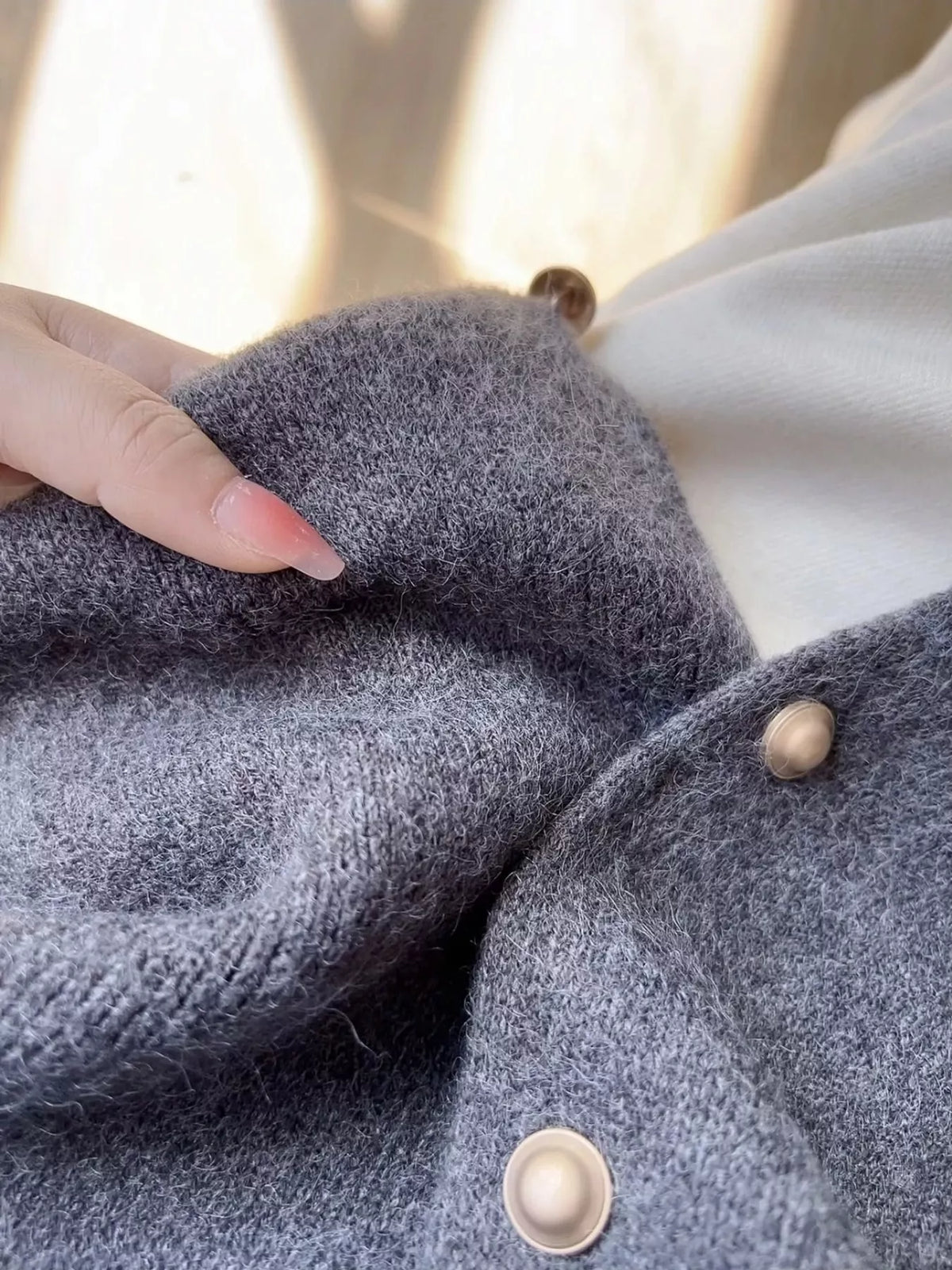 Button-Down Sweater Vest, detail view in dark gray