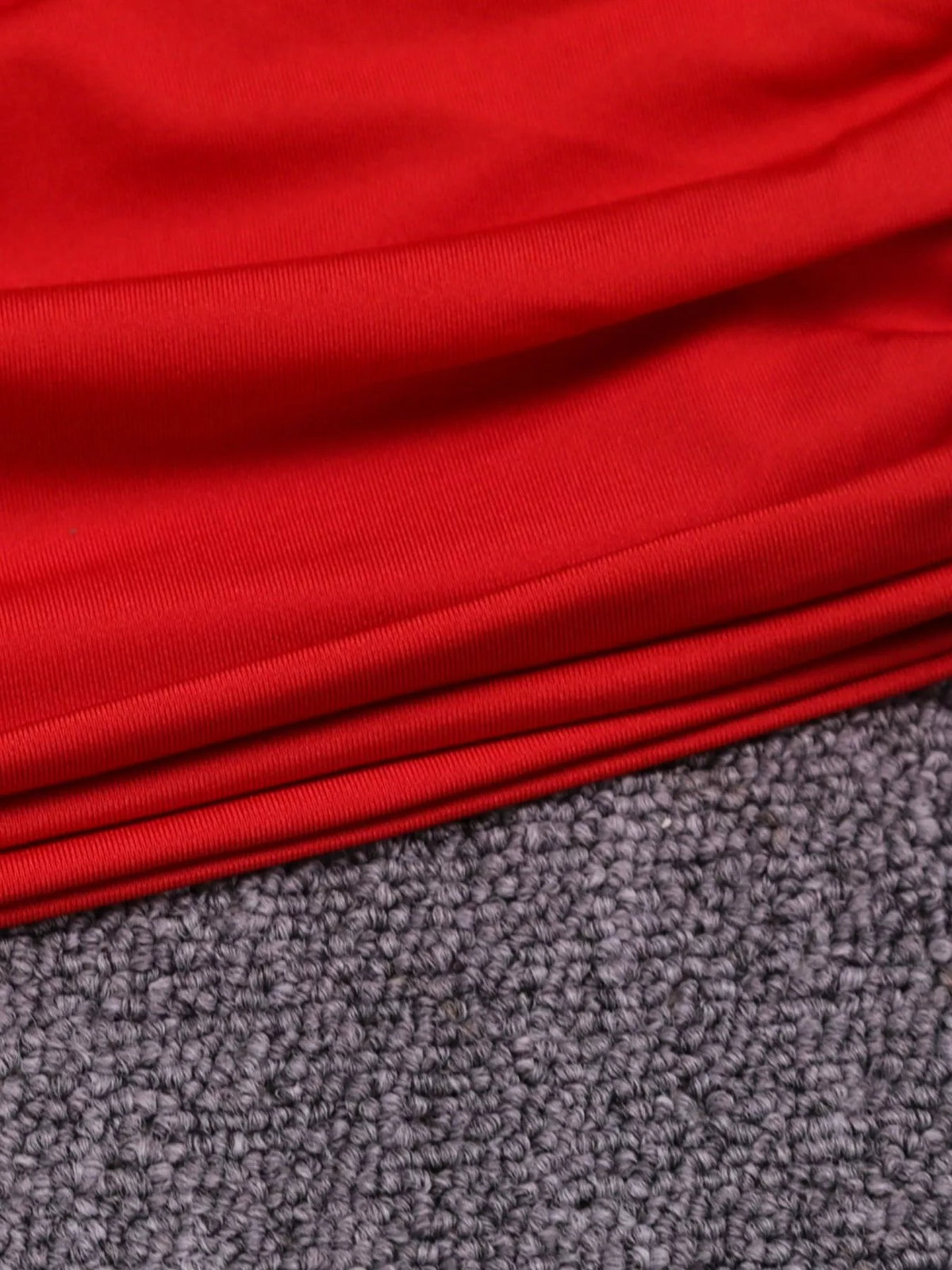 One-shoulder cutout dress, red fabric detail