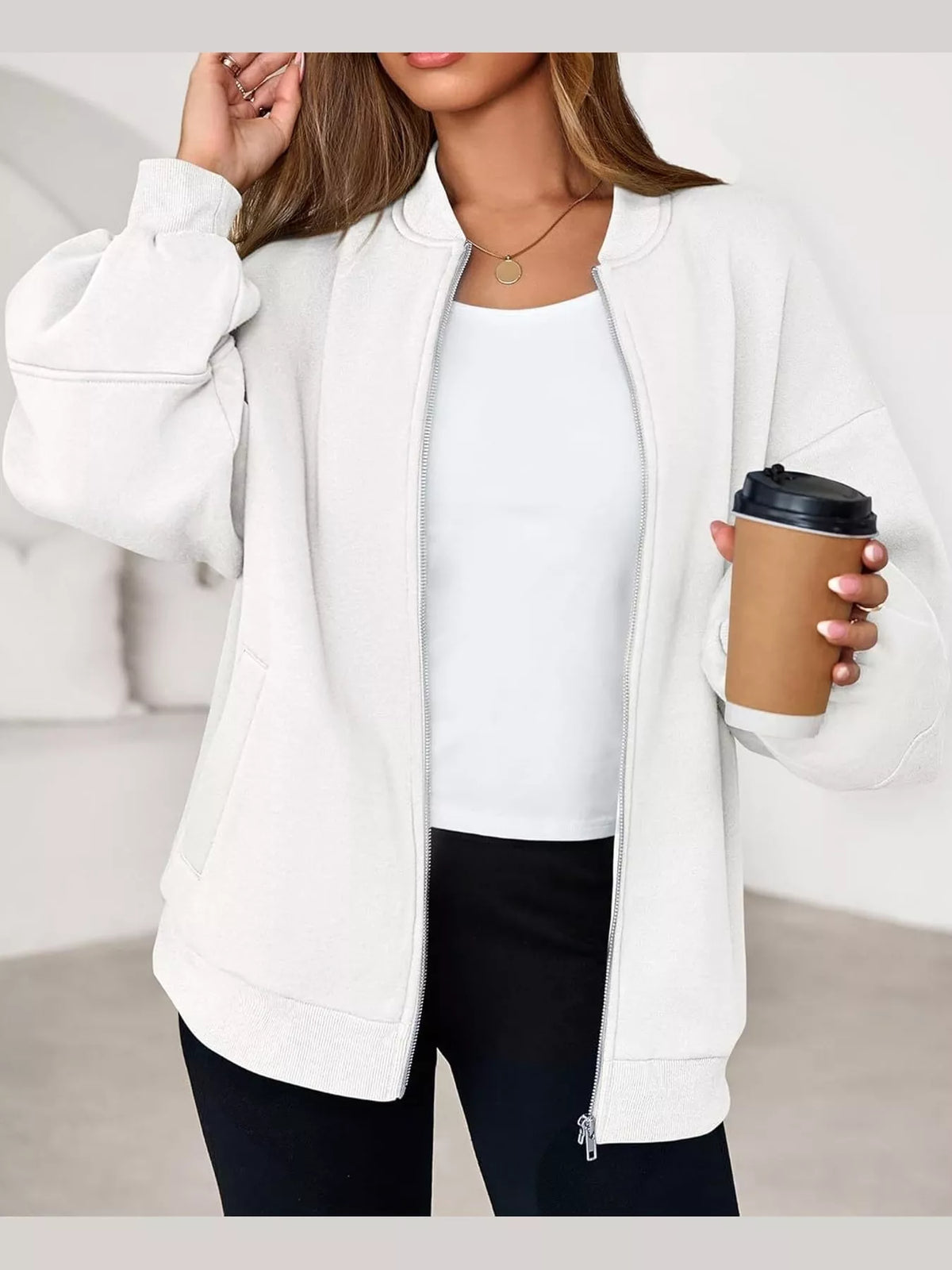 White oversized zip-up jacket — front view