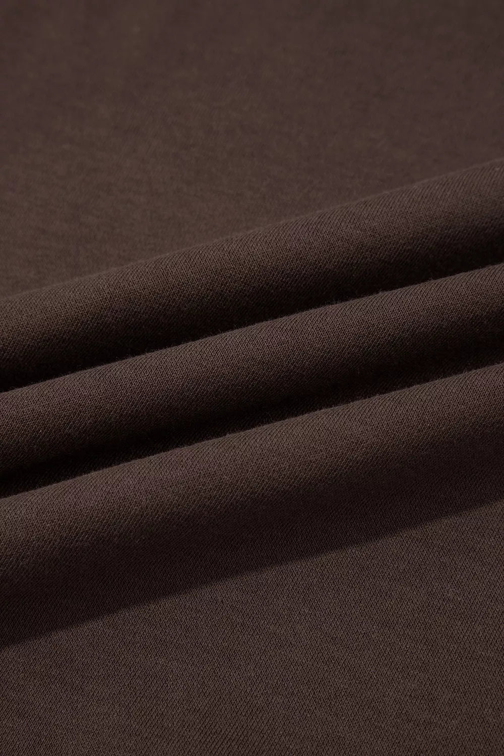 Brown slogan print sweatshirt, fabric close-up