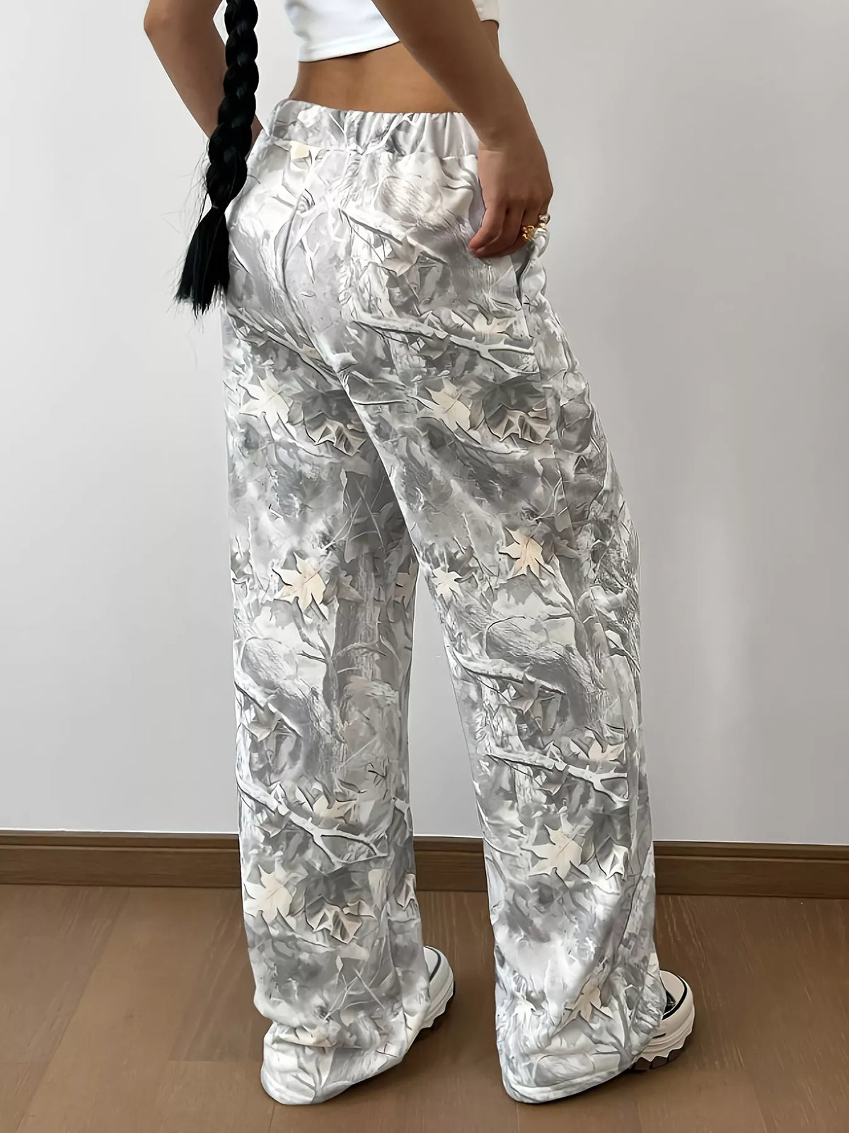 Gray and white wide-leg printed pants, back view