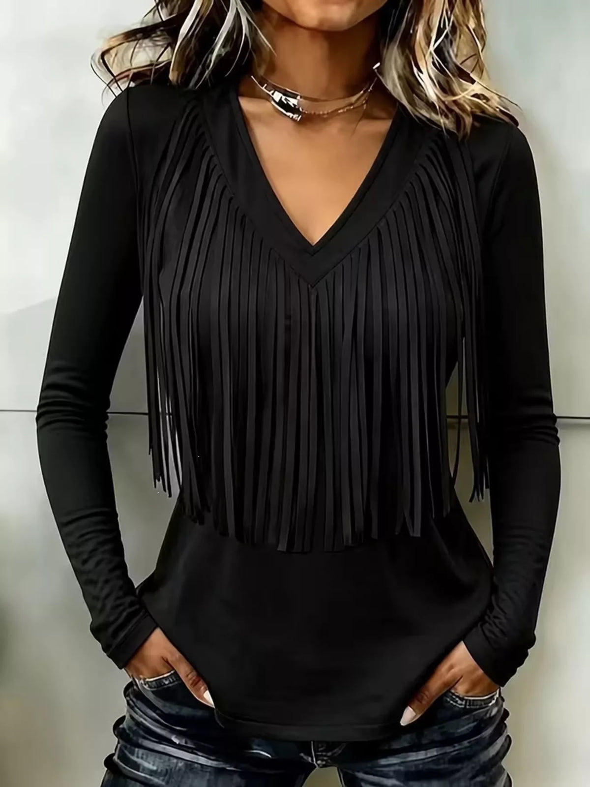 Black fringe V-neck top, front view