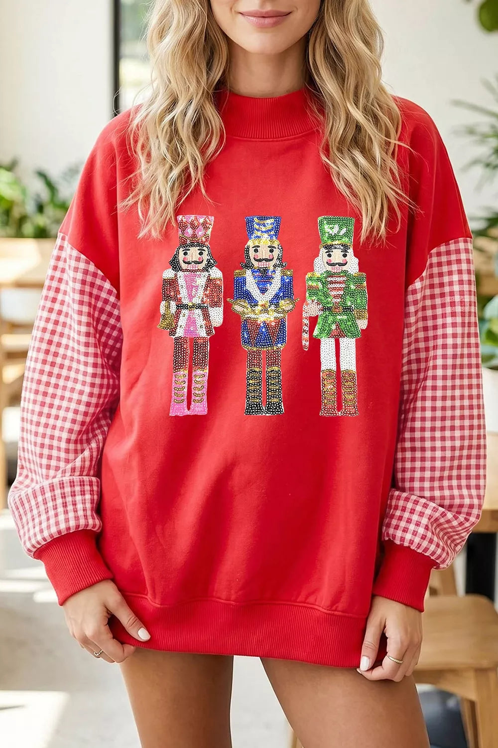Sequin Nutcracker Plaid Sleeve Pullover Sweatshirt in deep red, front view