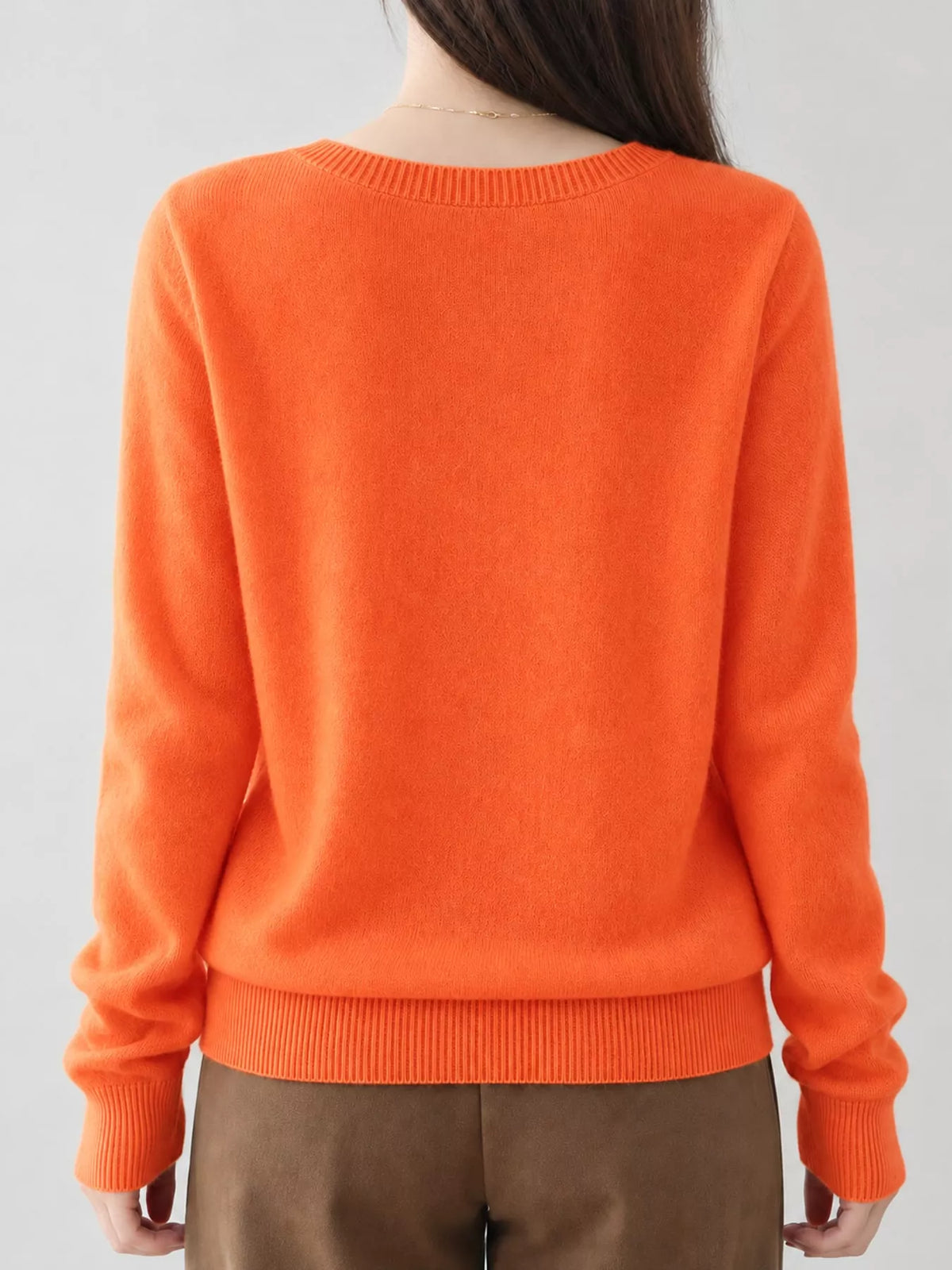V-Neck Knit Sweater, back view in orange