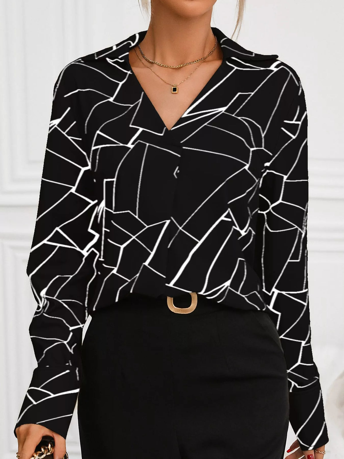 Black geometric print long sleeve blouse