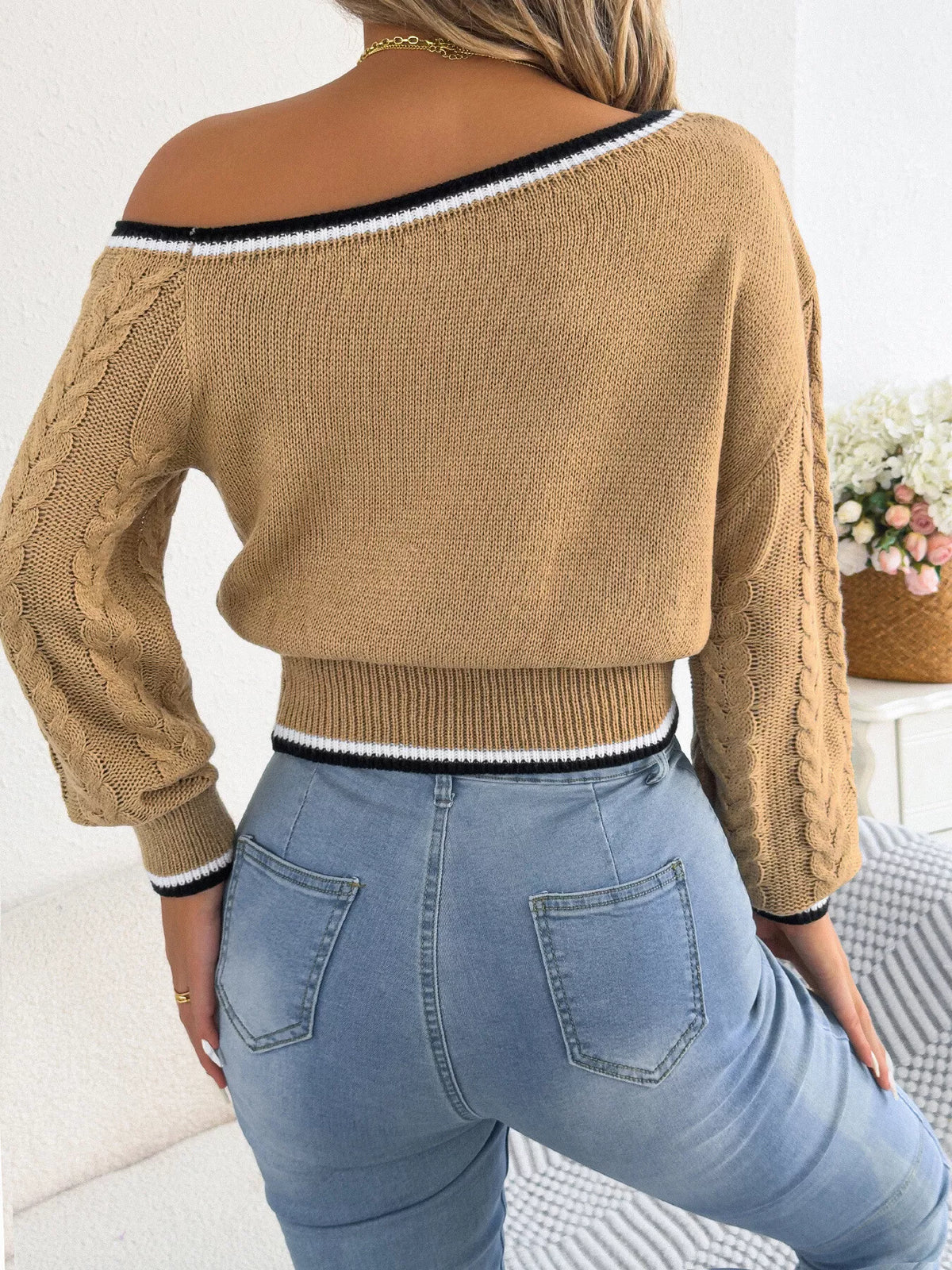 Khaki Color one-shoulder cable knit sweater with striped trim, back view