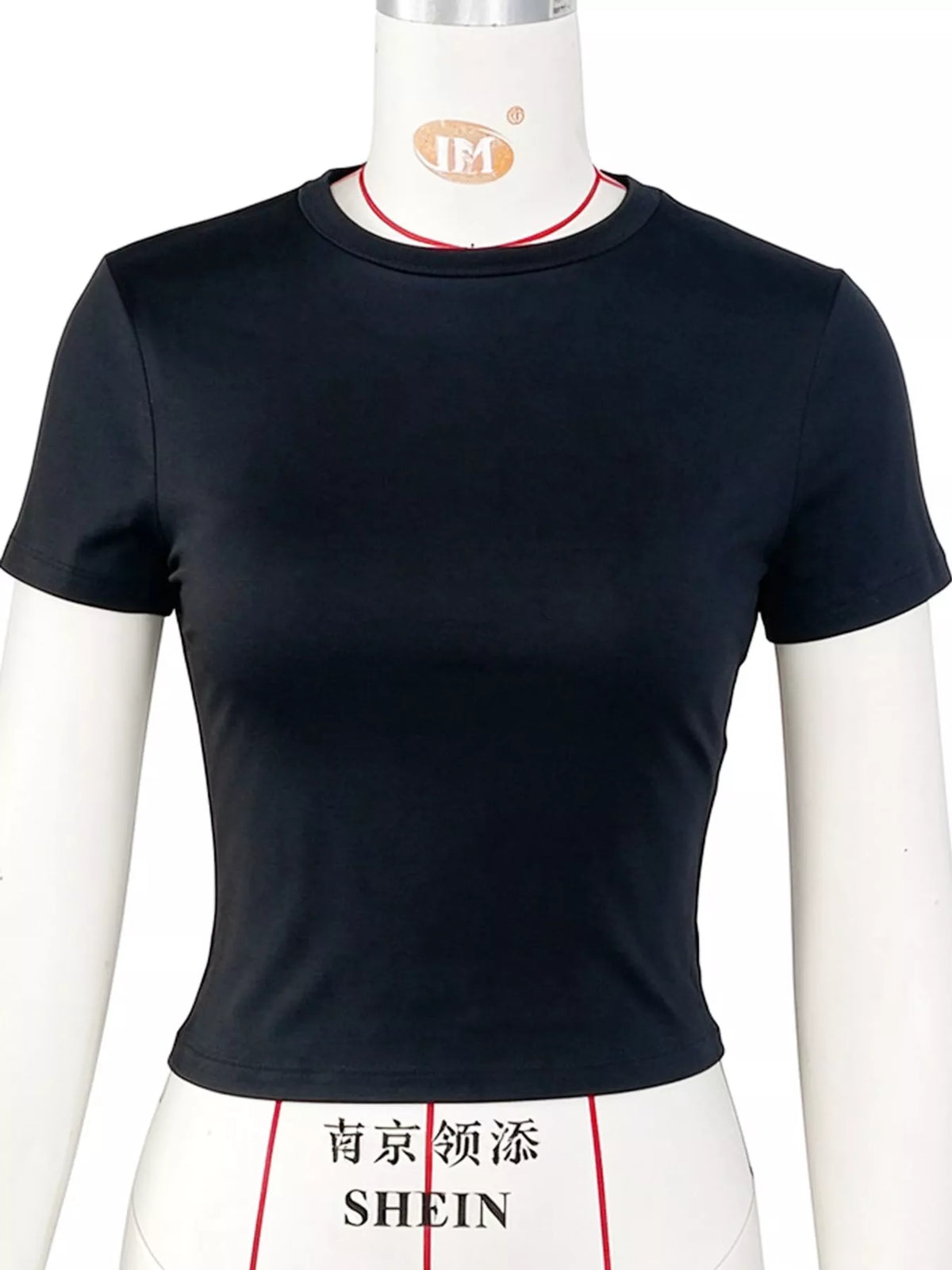 Black crew neck crop T-shirt, front on mannequin