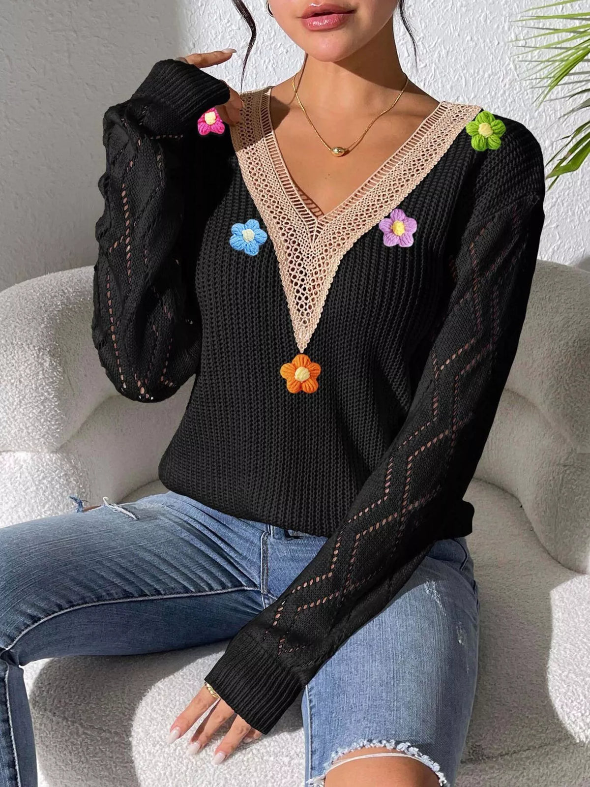 Black Floral Applique V-Neck Openwork Sweater seated view