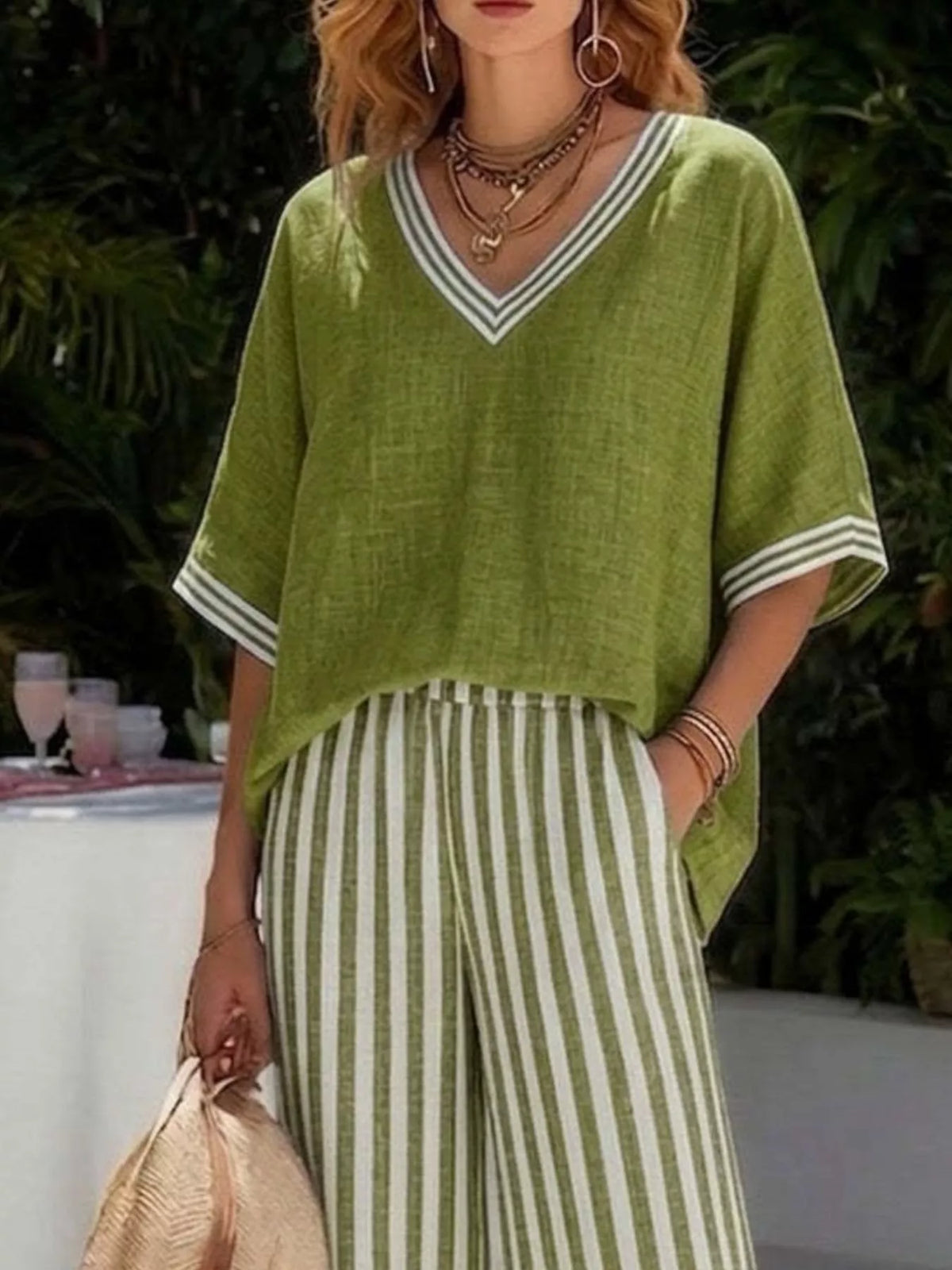 Green v-neck striped top and pants two-piece set — design and construction details