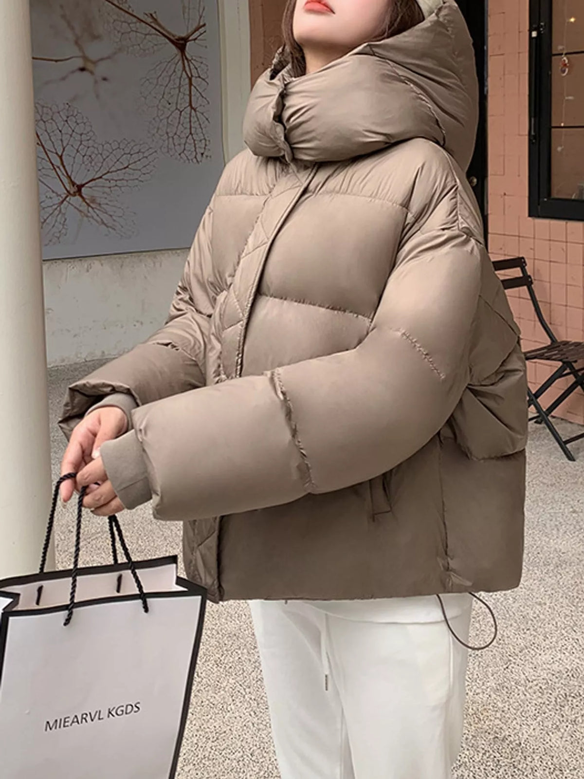 Taupe quilted hooded puffer jacket, front view