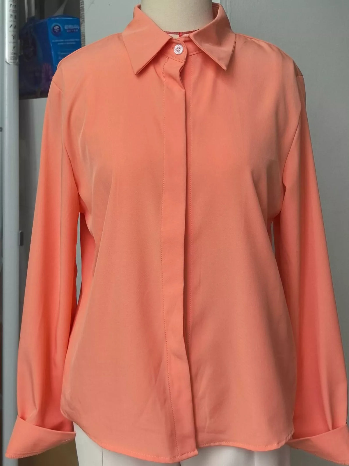 Button-up shirt, coral hanging front